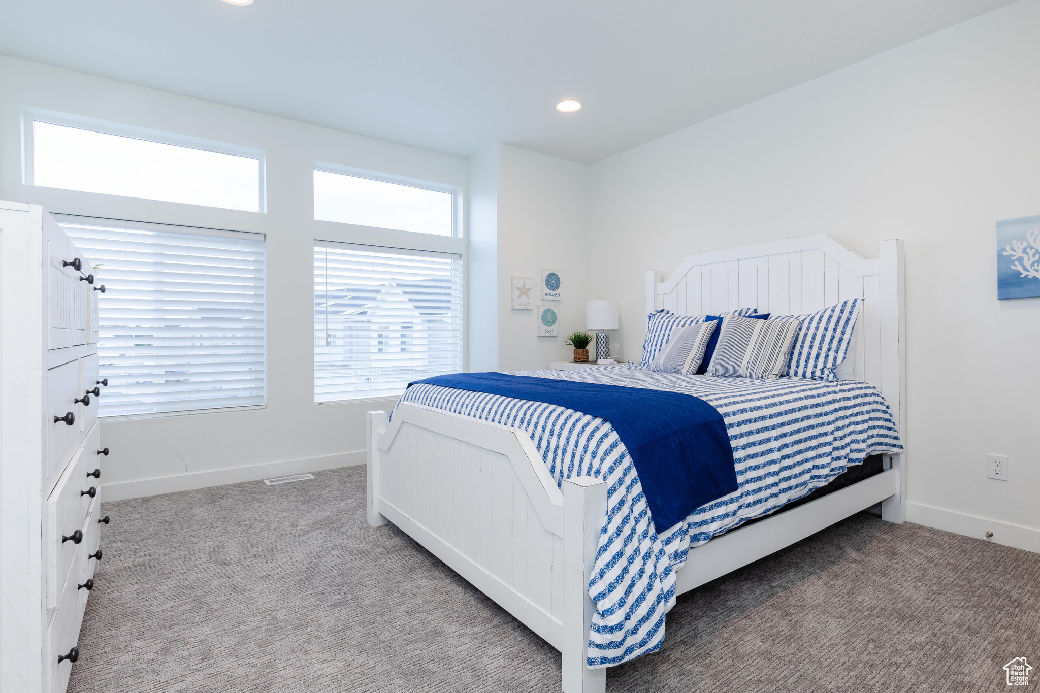 Bedroom with light carpet