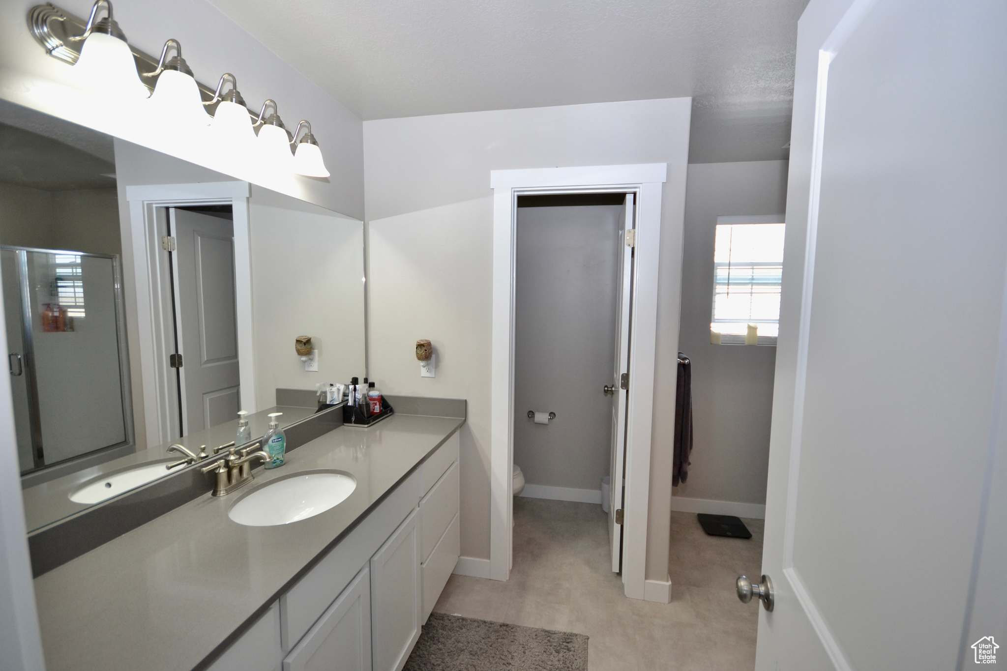 Bathroom with vanity and toilet