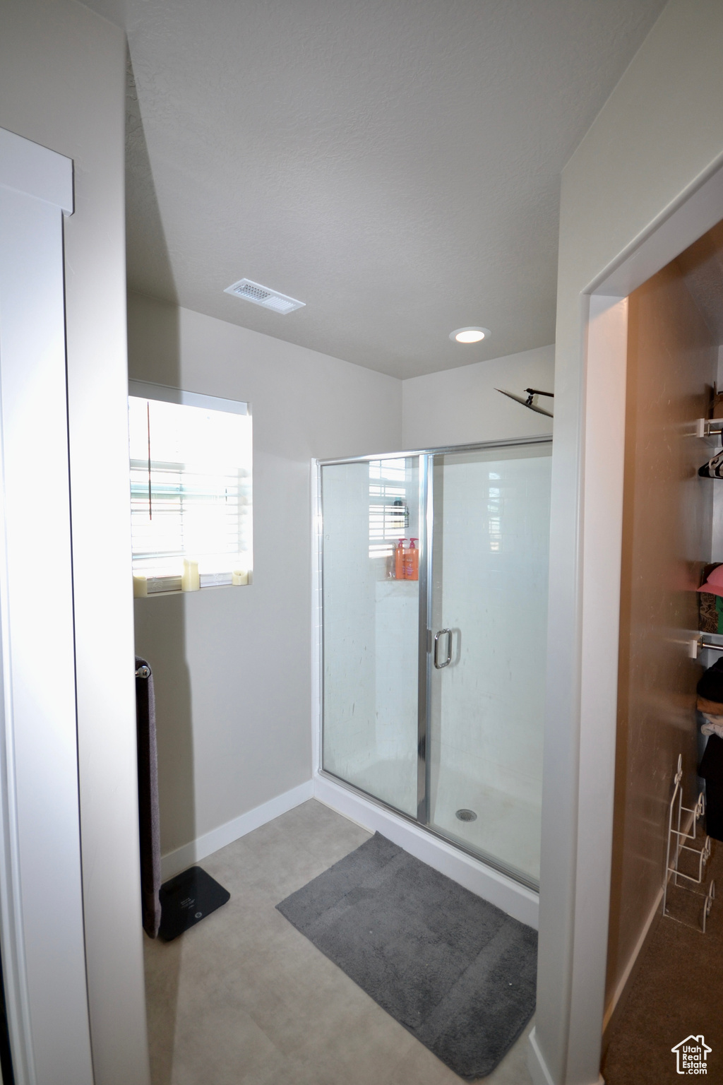 Bathroom with an enclosed shower