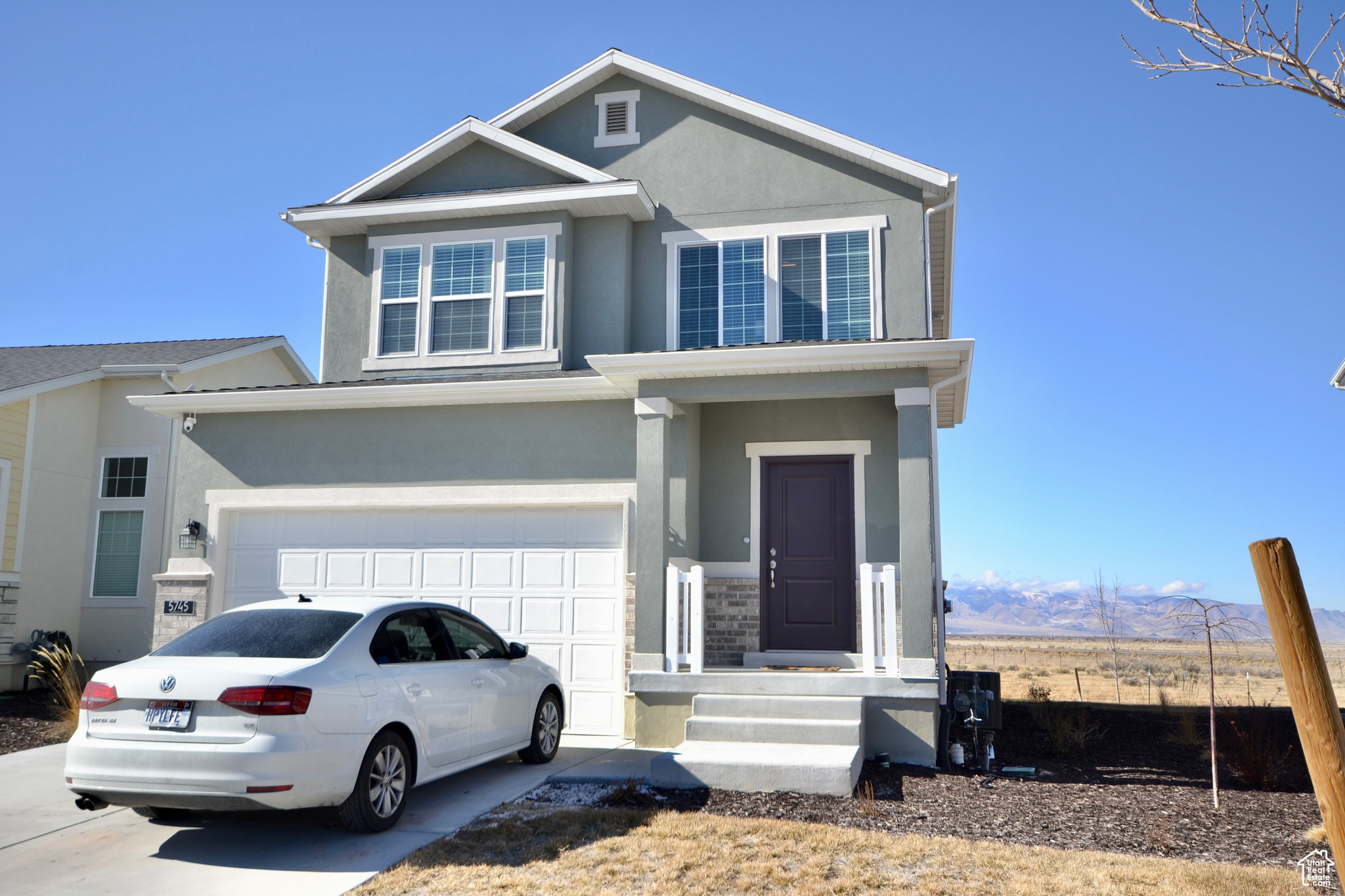 View of front facade with a garage