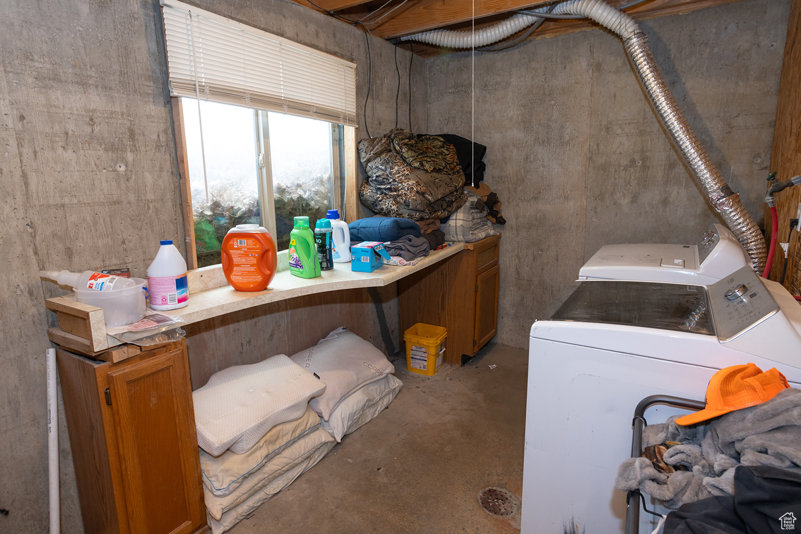 Laundry room featuring washer and clothes dryer