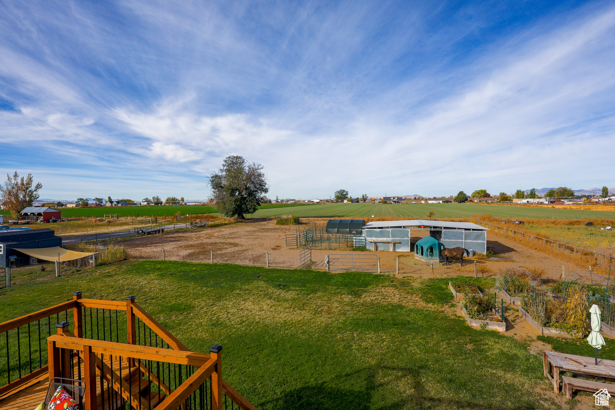 View of yard with an outbuilding and a rural view