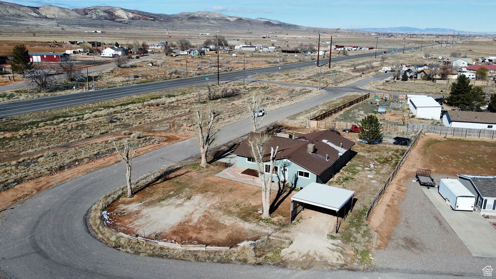 Birds eye view of property with a mountain view