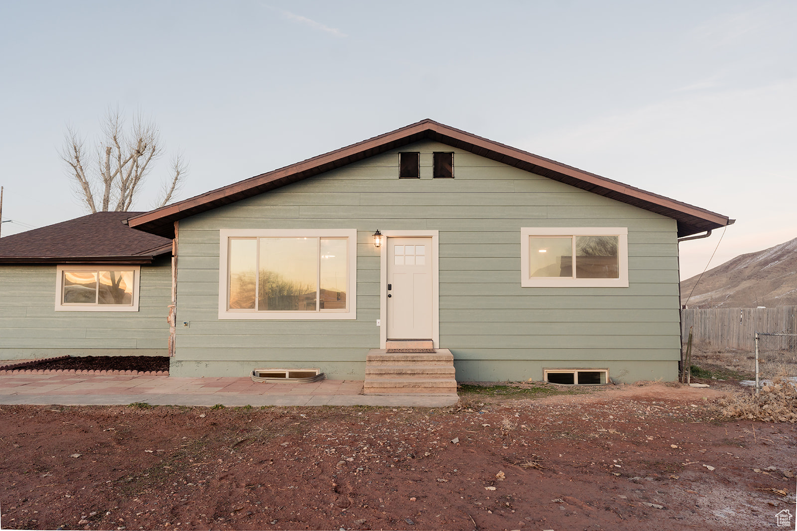 View of front of home featuring a patio area
