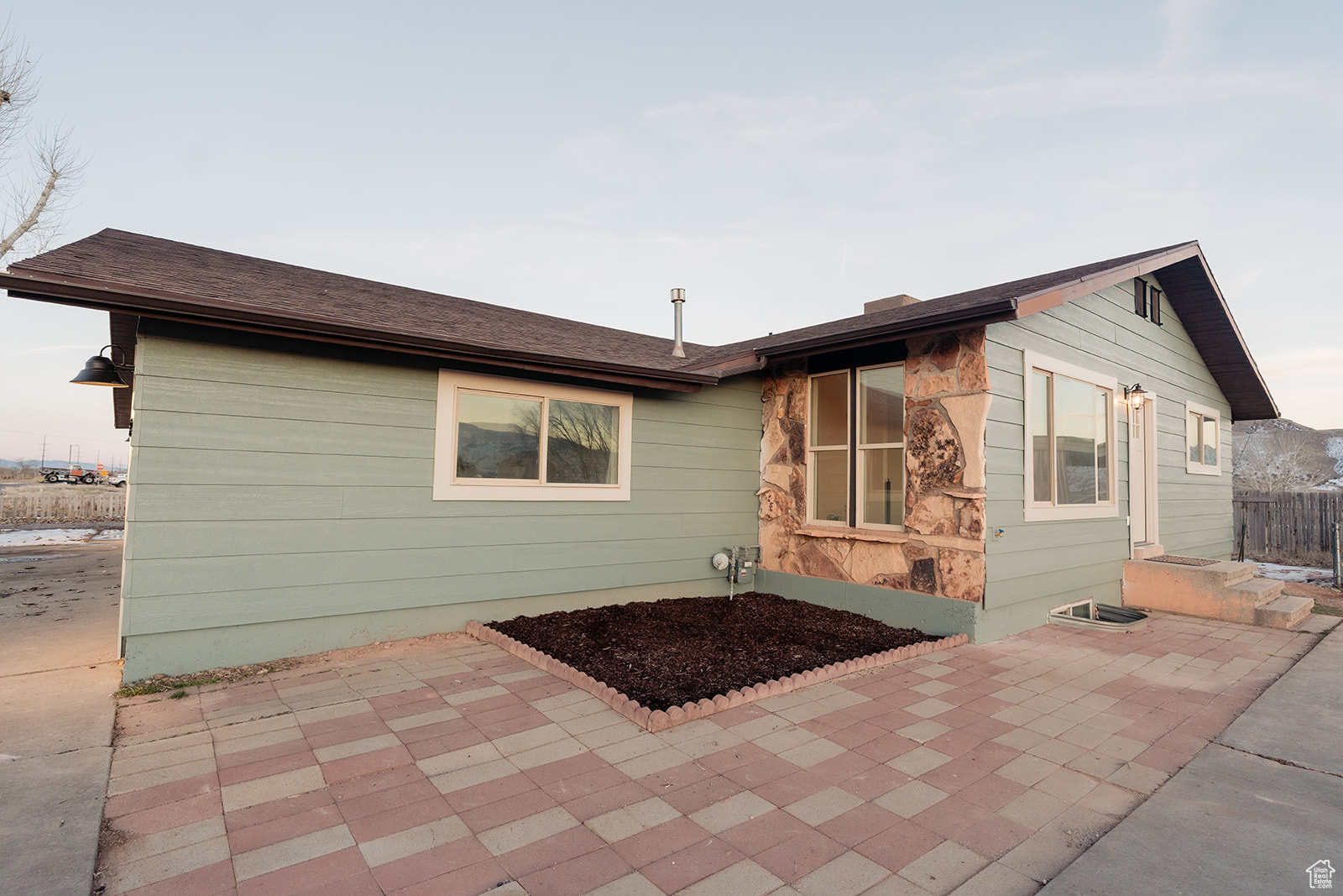 Back of property featuring a patio