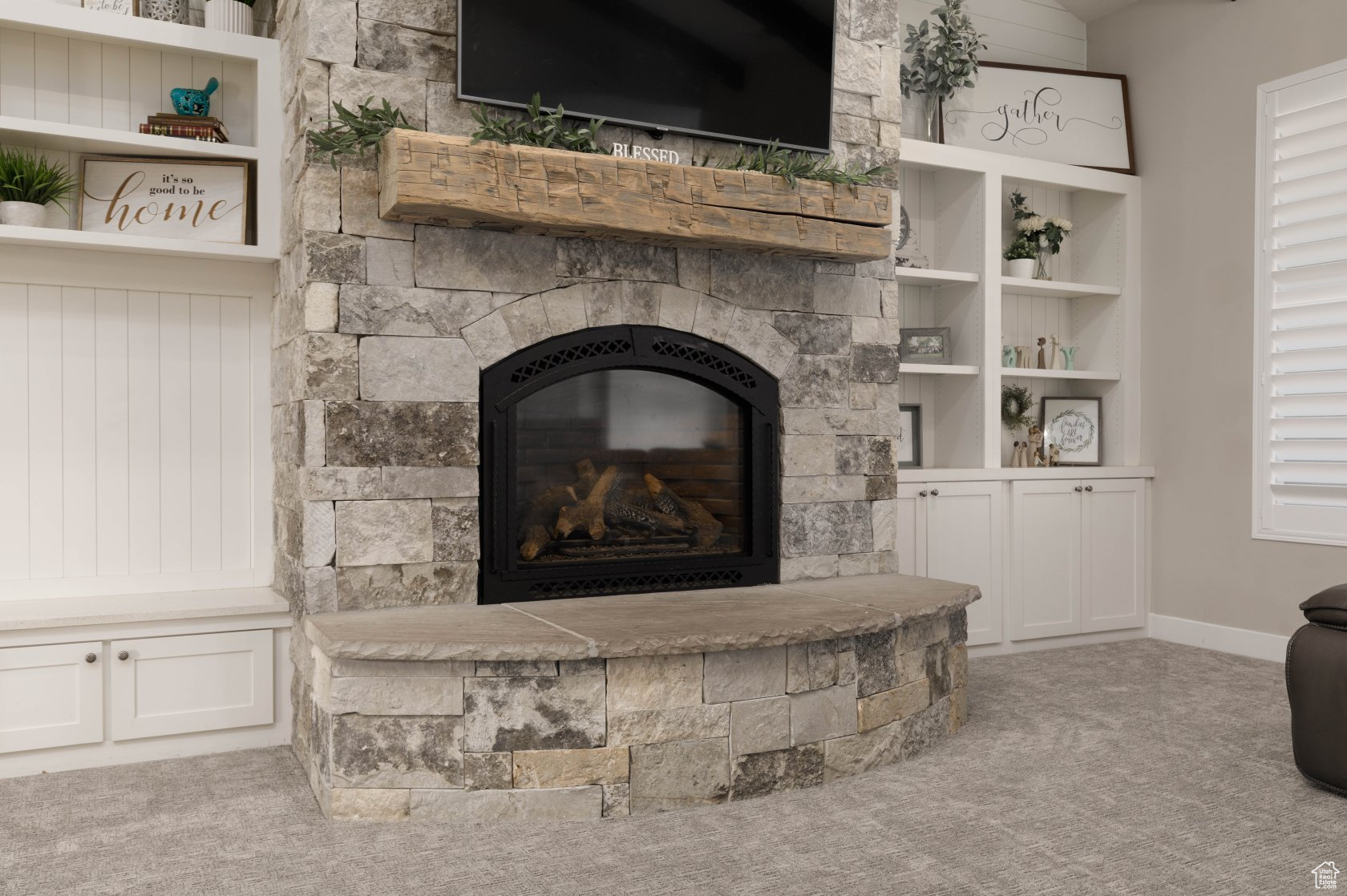 Details with a stone fireplace