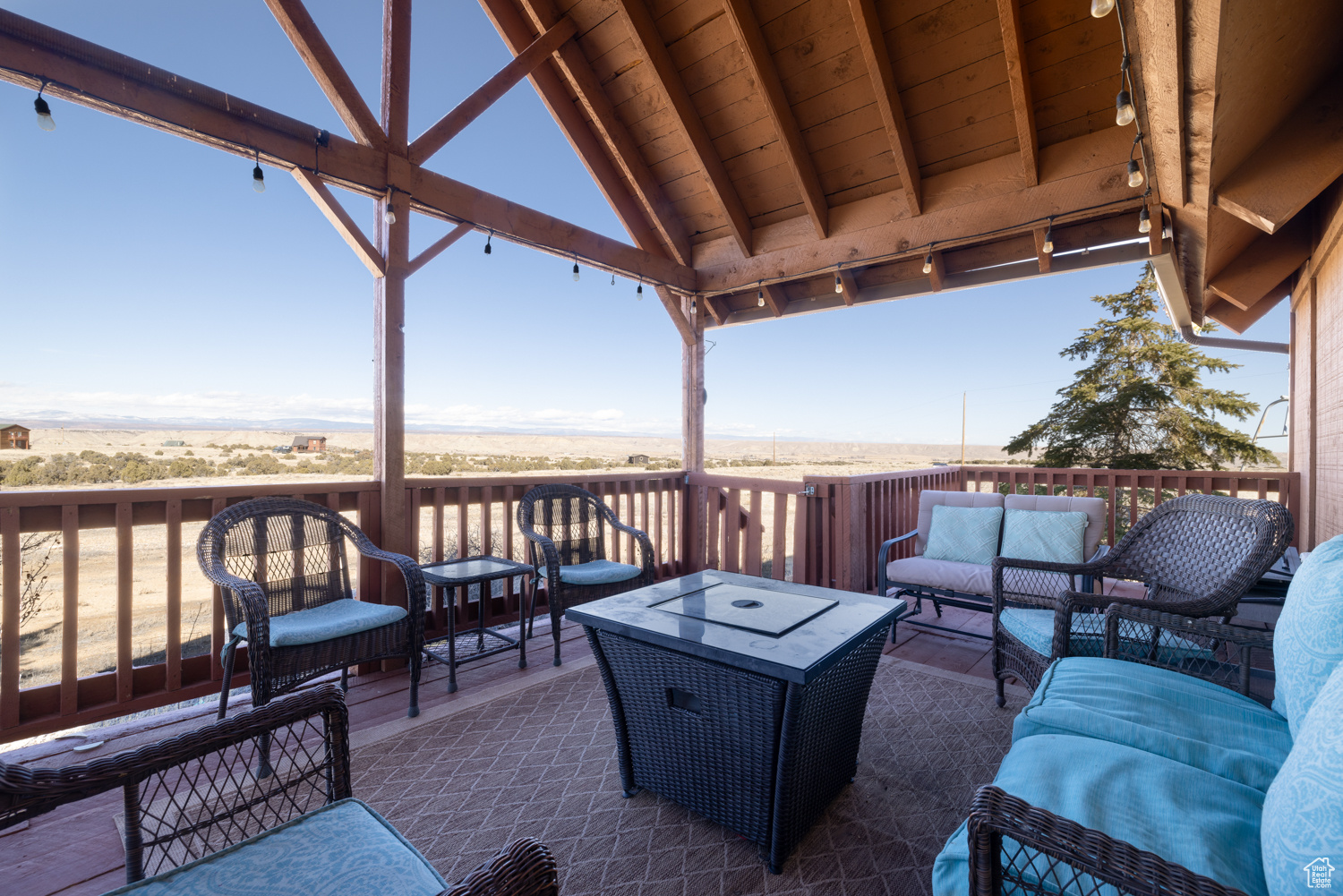 View of patio / terrace featuring an outdoor living space, a gazebo, and a wooden deck
