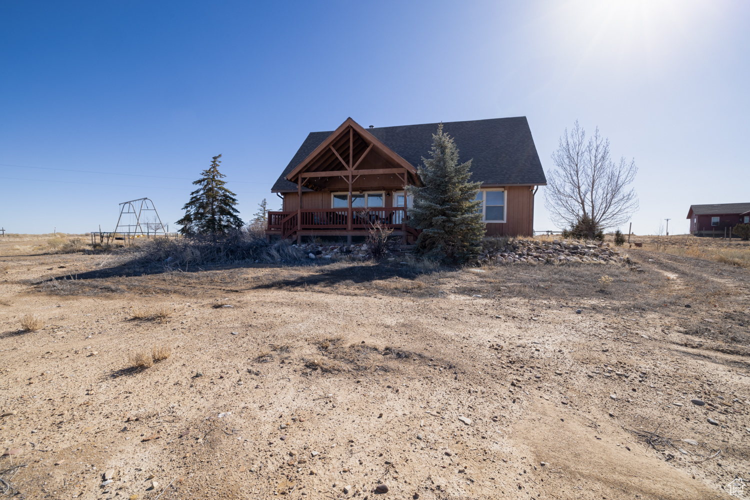 Exterior space with a rural view and a deck