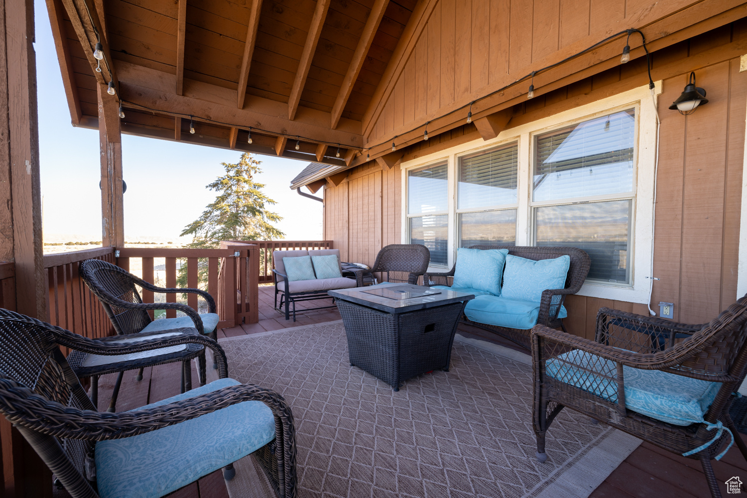 View of patio / terrace with a wooden deck and an outdoor hangout area