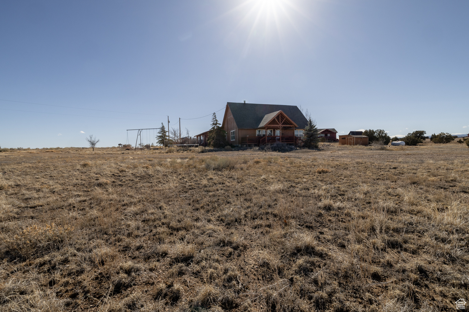 View of yard with a rural view