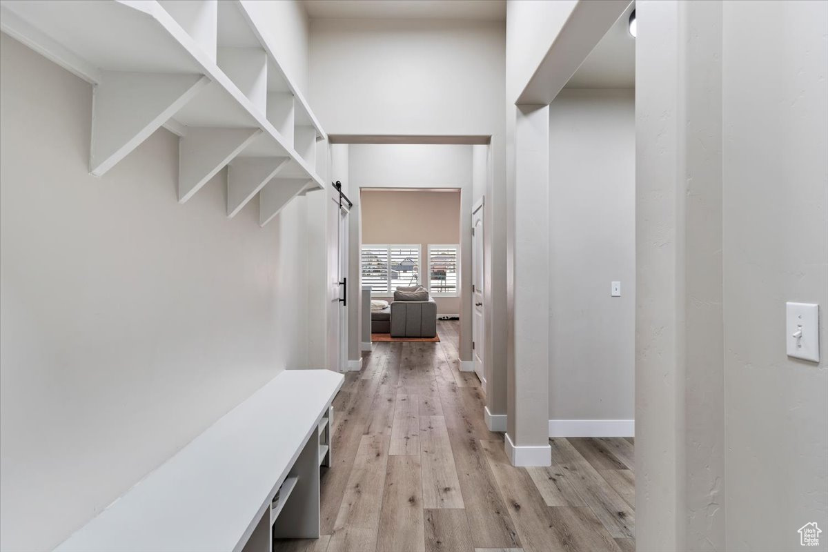 Mudroom with light wood-type flooring