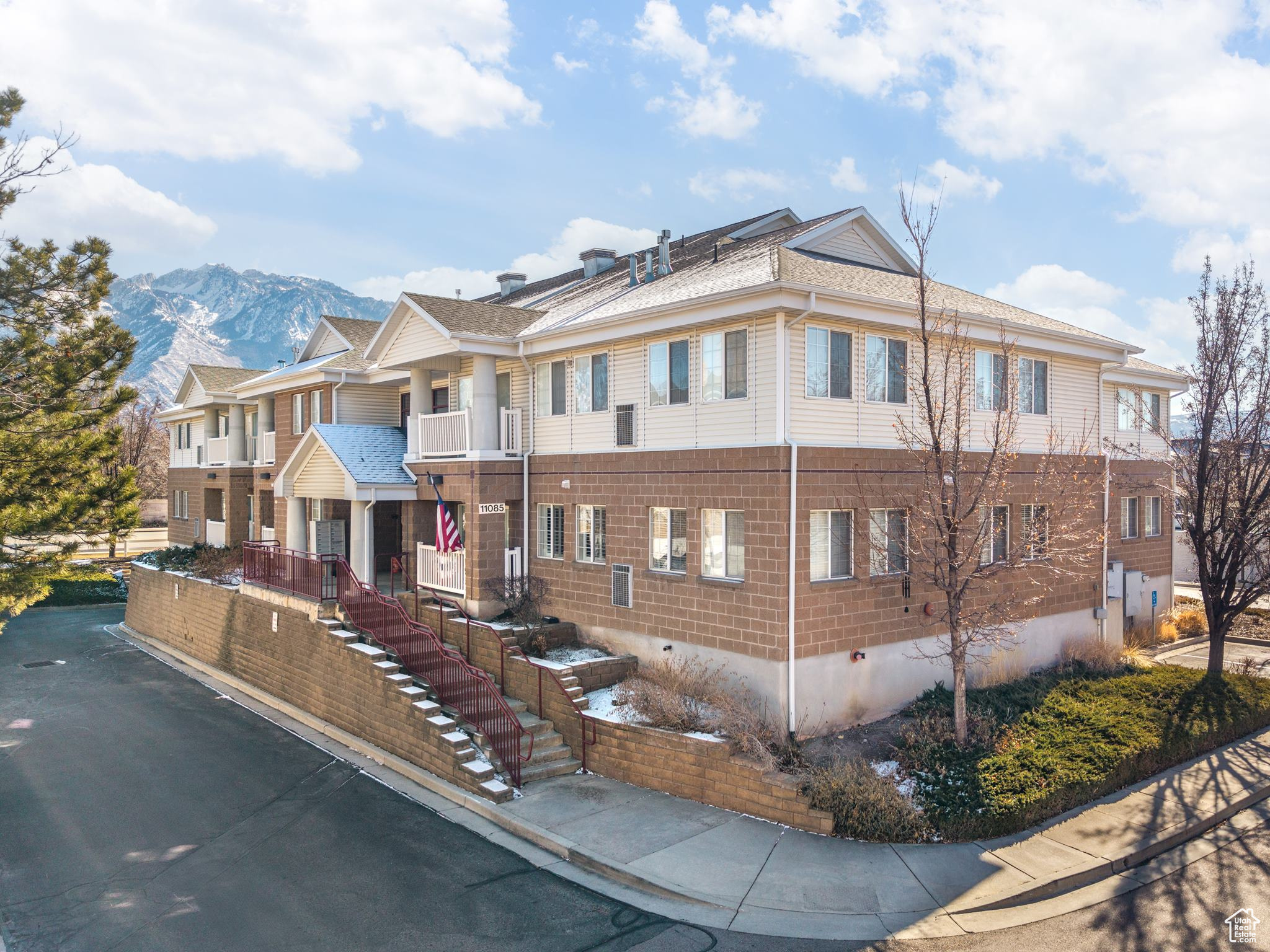 View of front of building with a mountain view