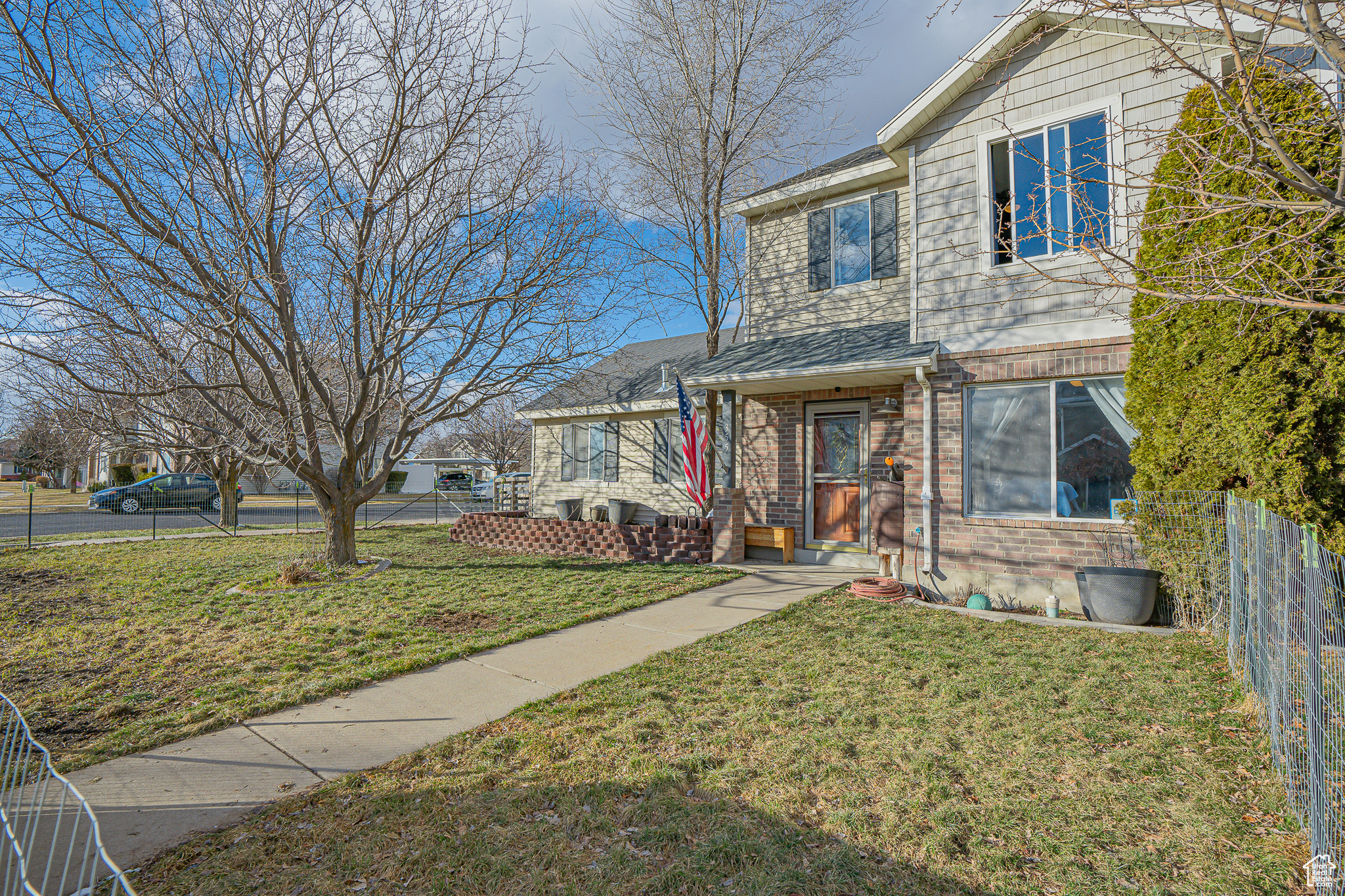 View of front of home featuring a front lawn