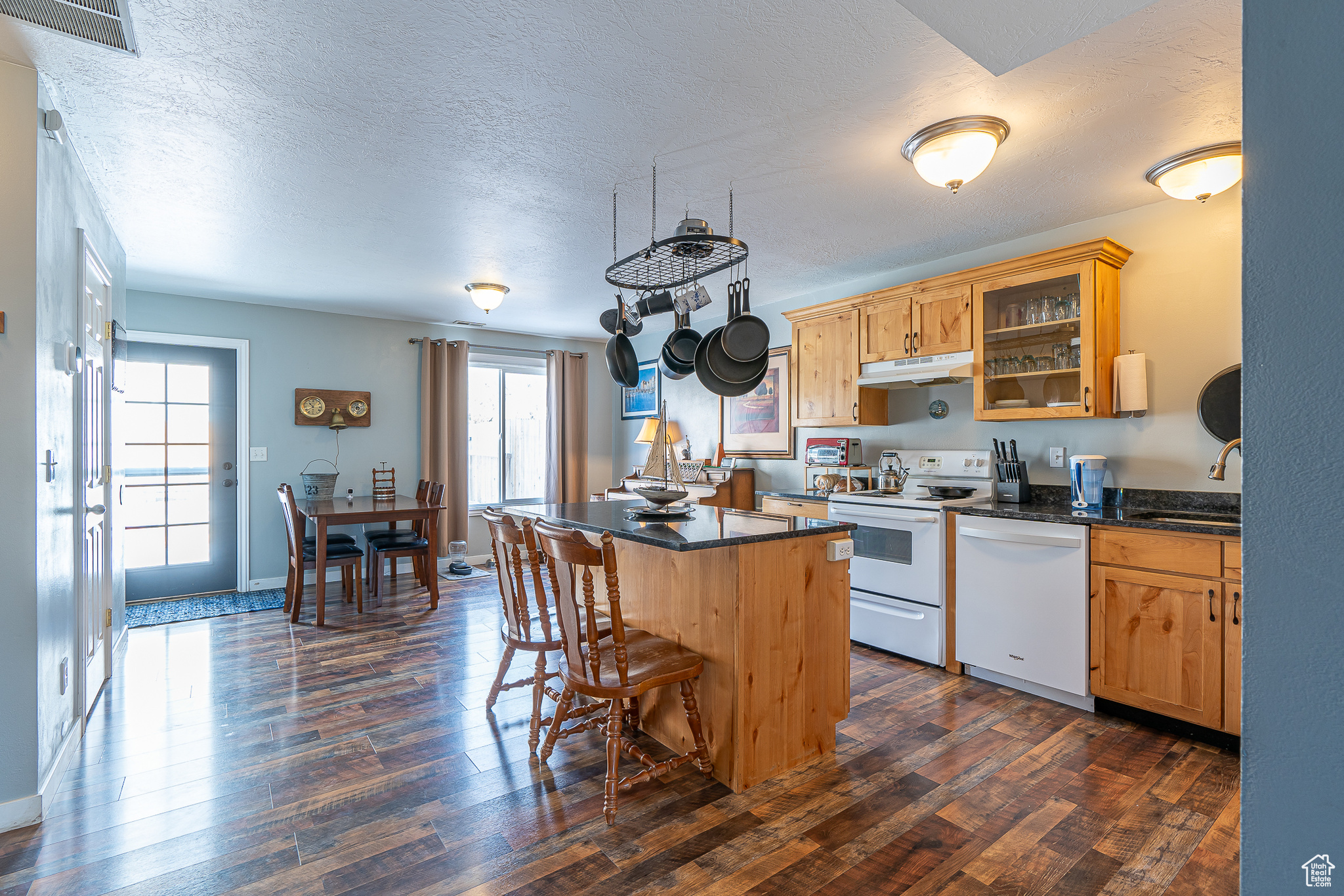 Kitchen with upgraded granite countertops, undermount sink, and new dishwasher in 2022