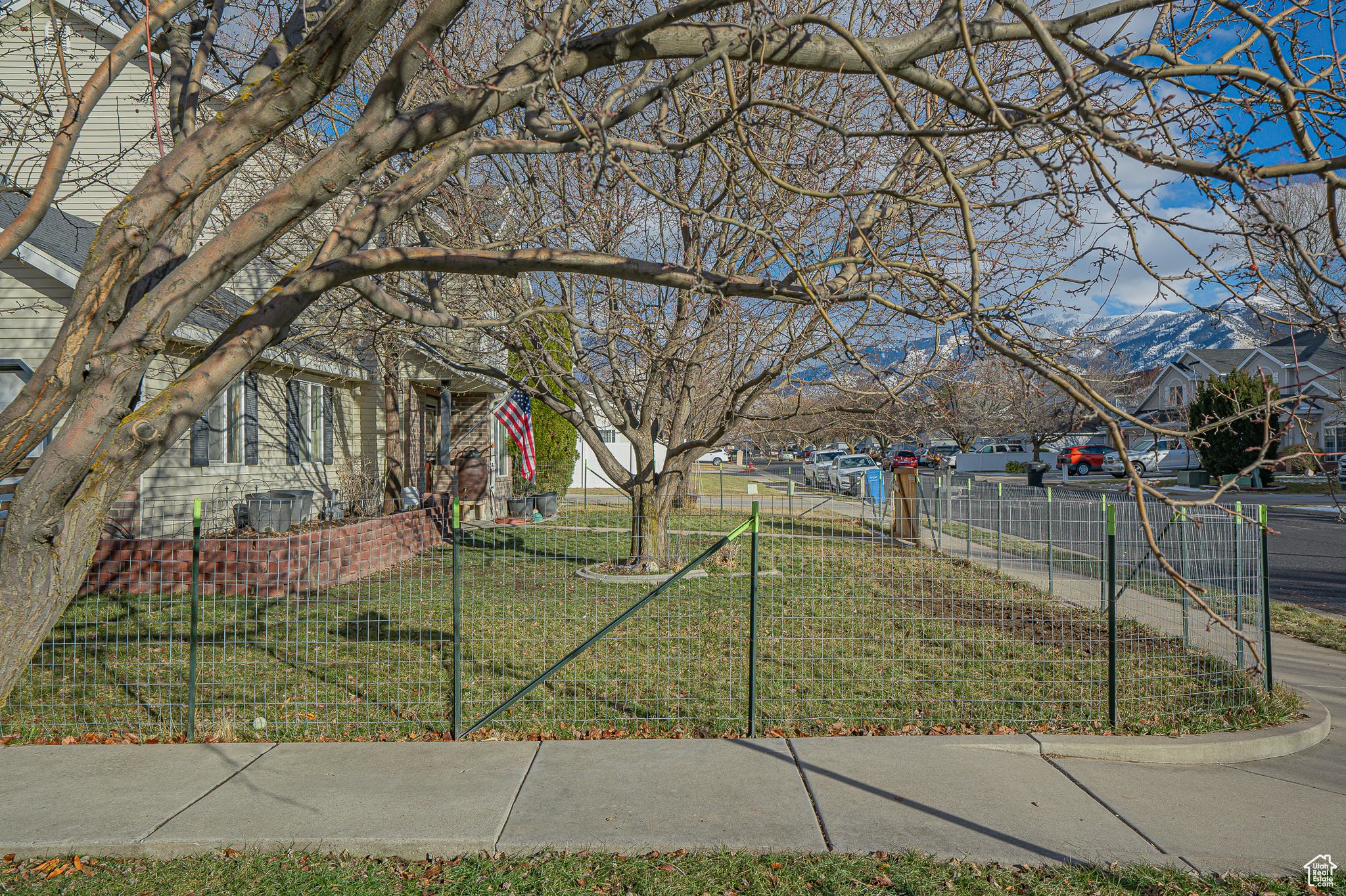 Front yard with temporary fence (see remarks)