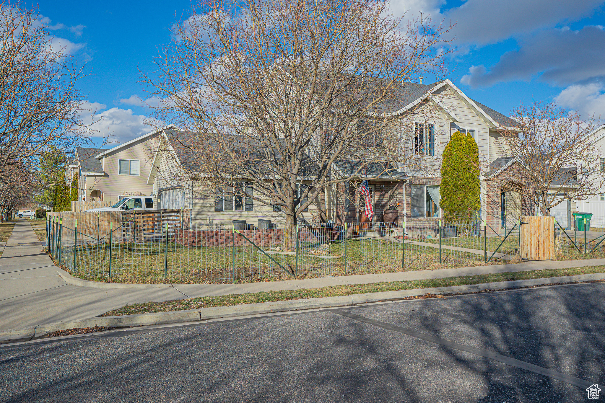 Front yard with temporary fence (see remarks)