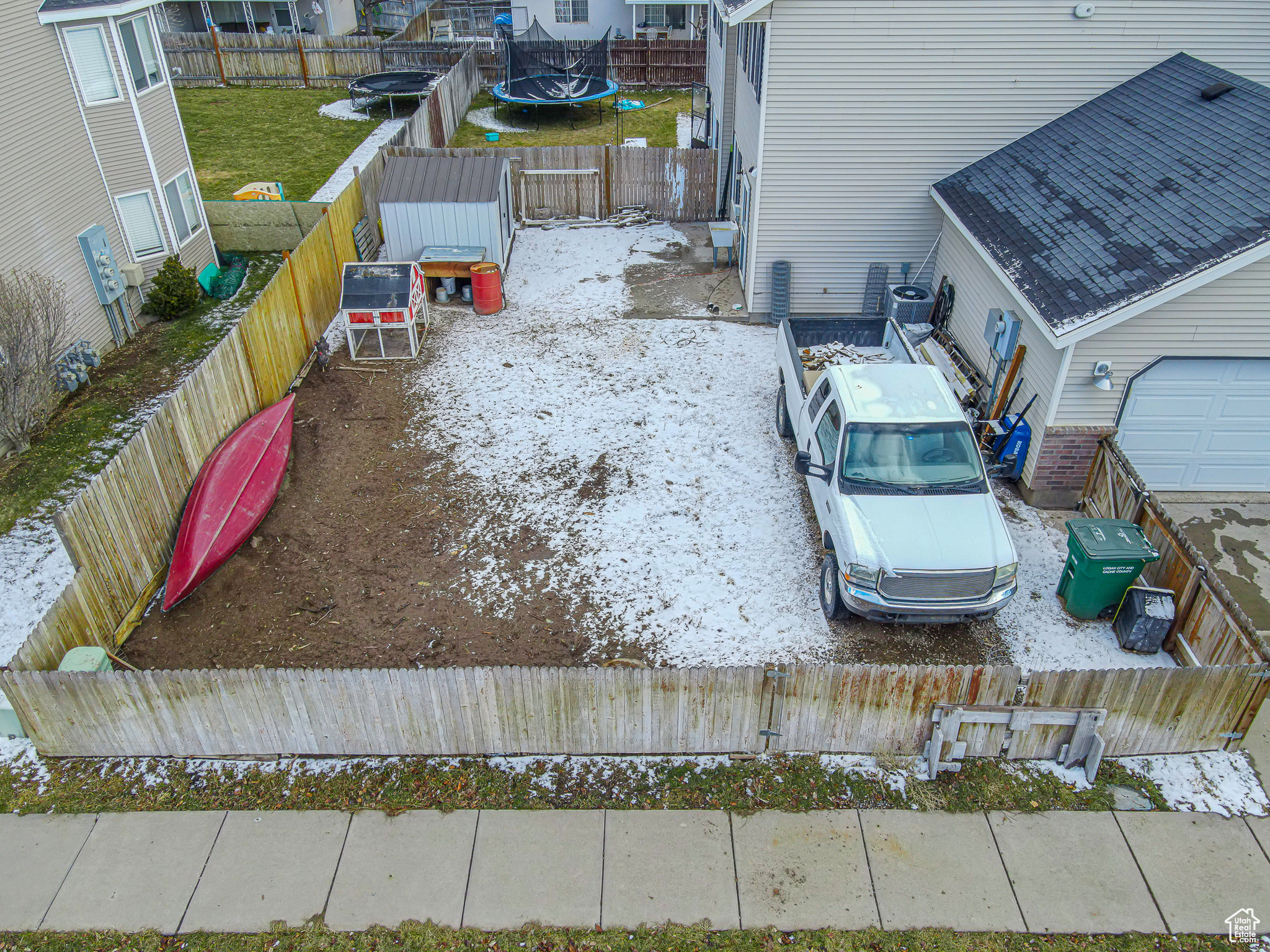 View of yard with a trampoline