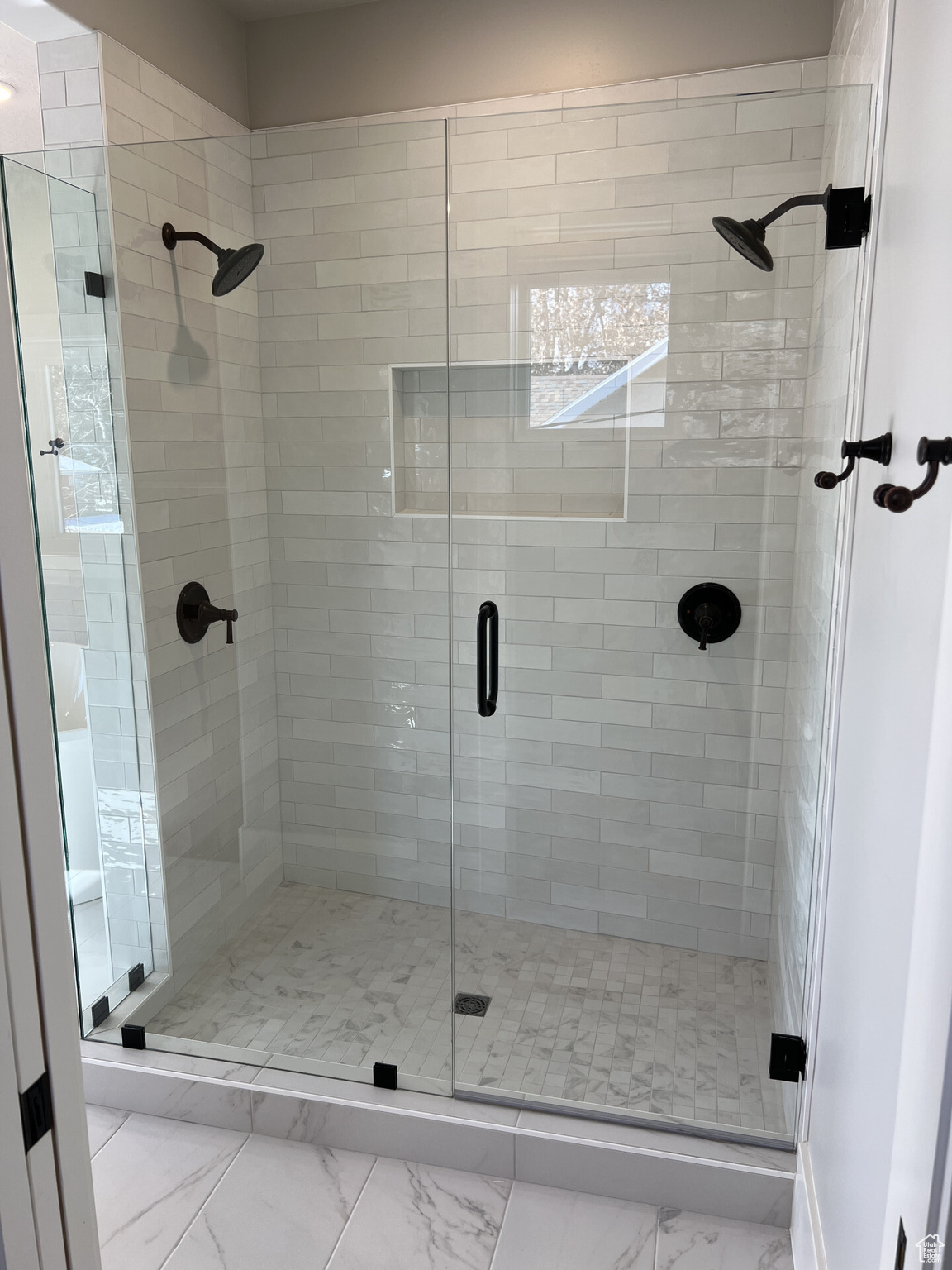 Bathroom featuring a shower with shower door