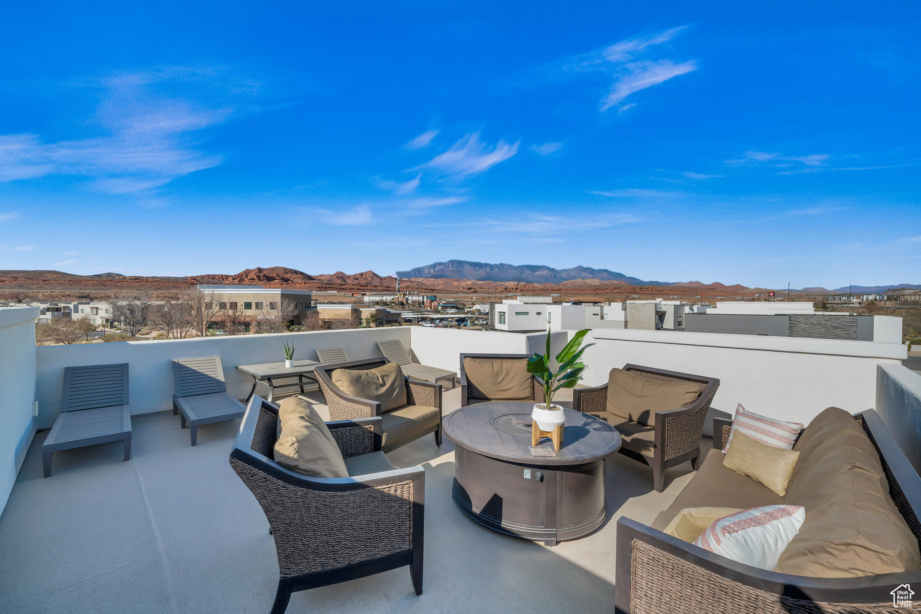 View of patio with a mountain view and outdoor lounge area