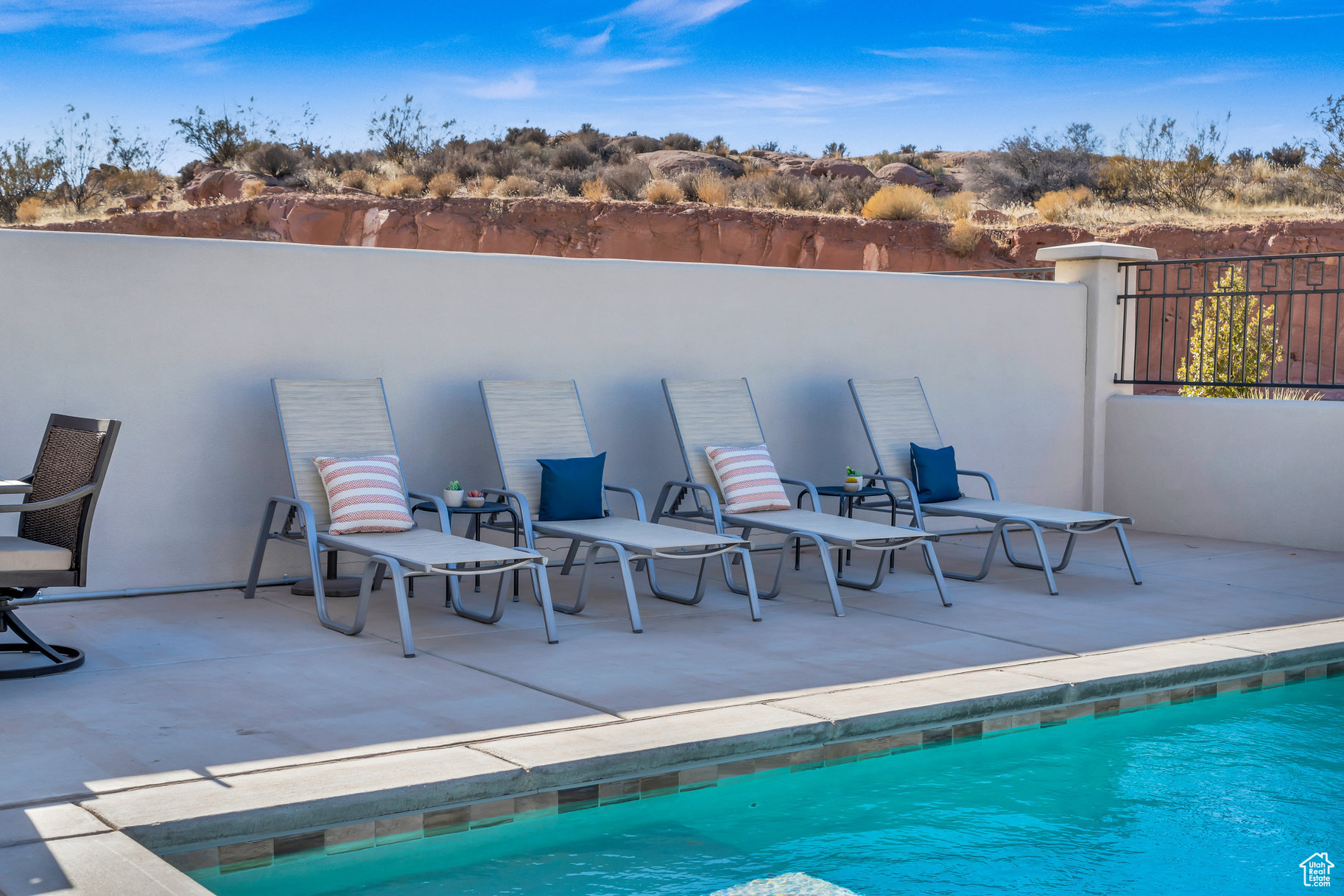 View of swimming pool with a patio area