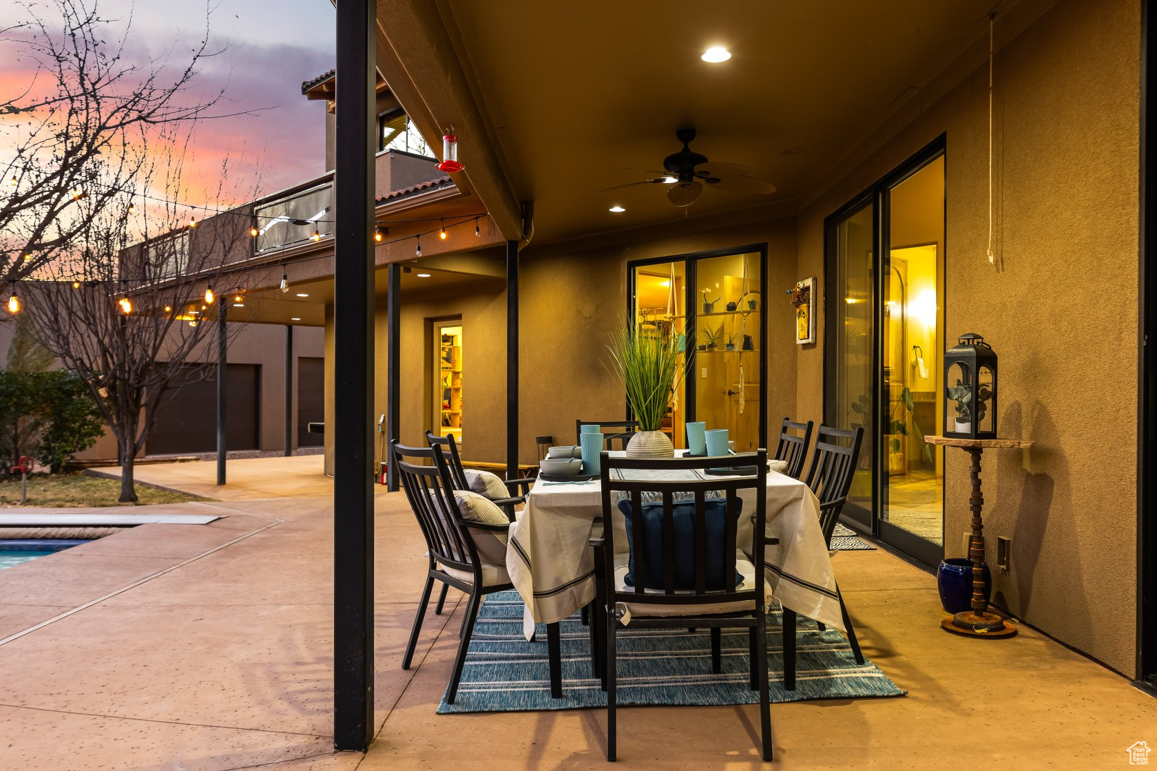 Patio terrace at dusk with ceiling fan