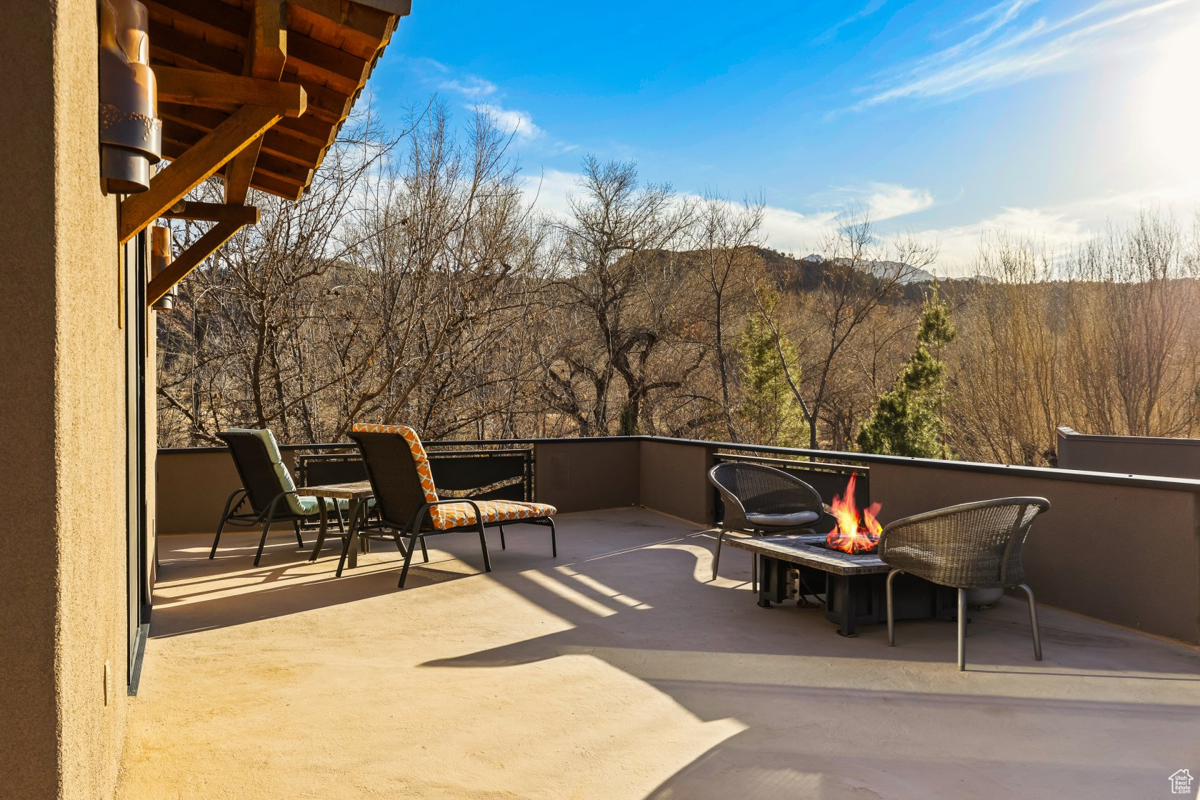 View of patio / terrace with an outdoor fire pit