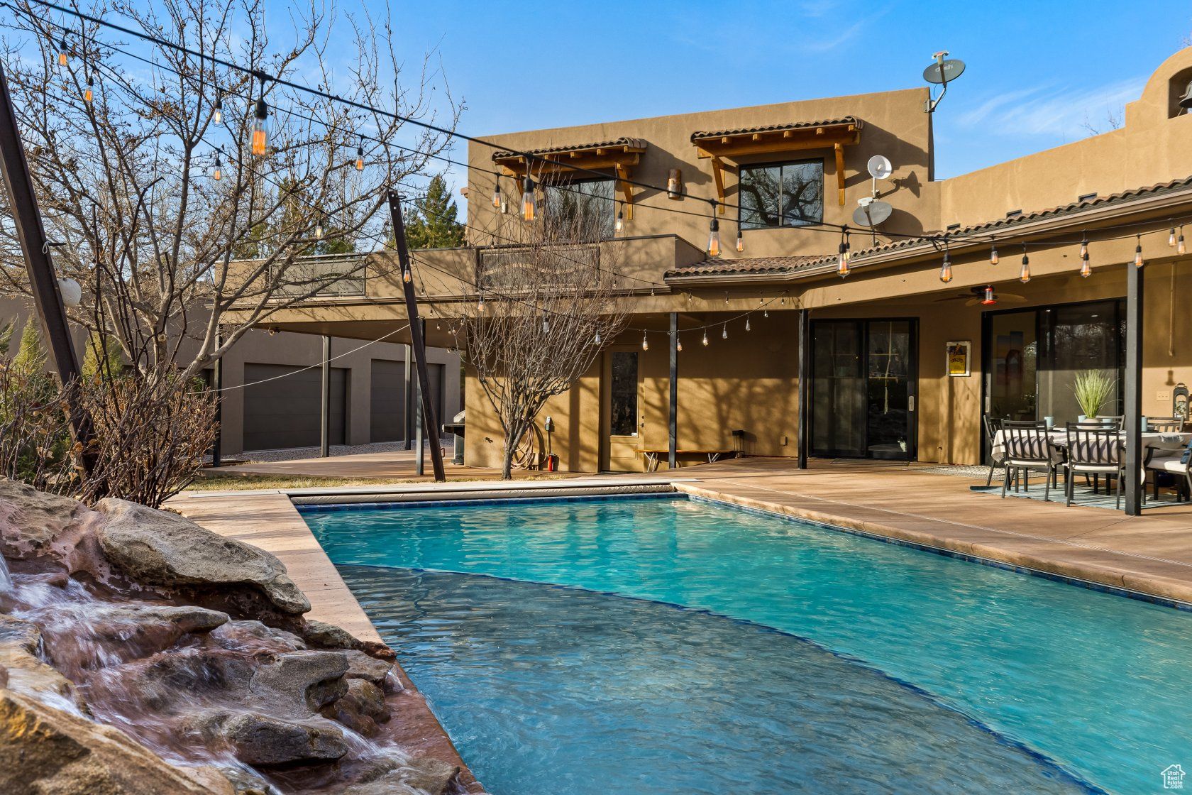 View of swimming pool with a patio