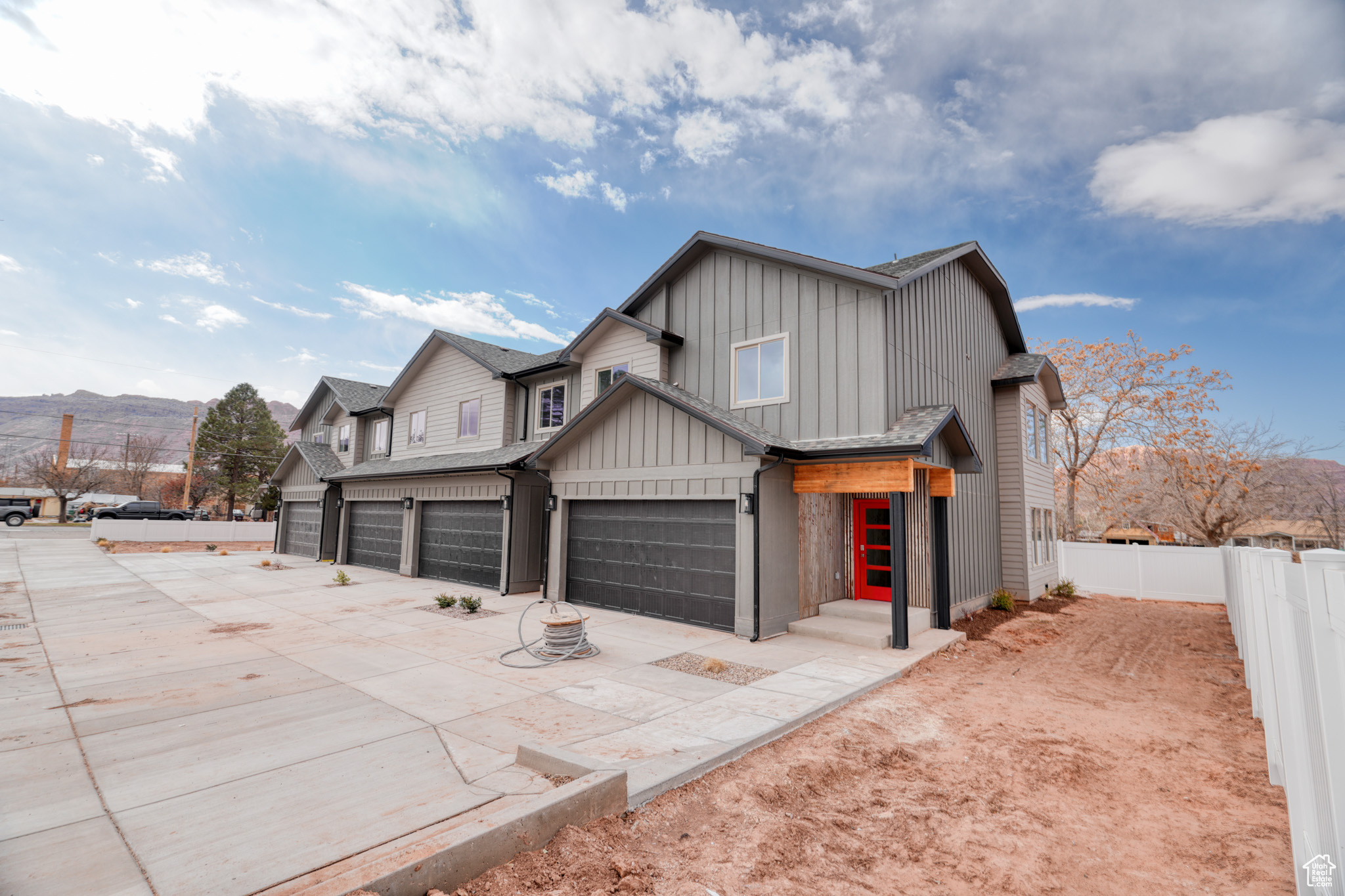 View of front facade featuring a mountain view and a garage