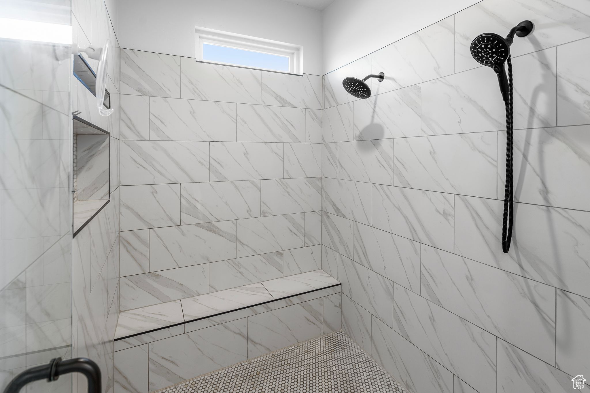 Bathroom with tiled shower