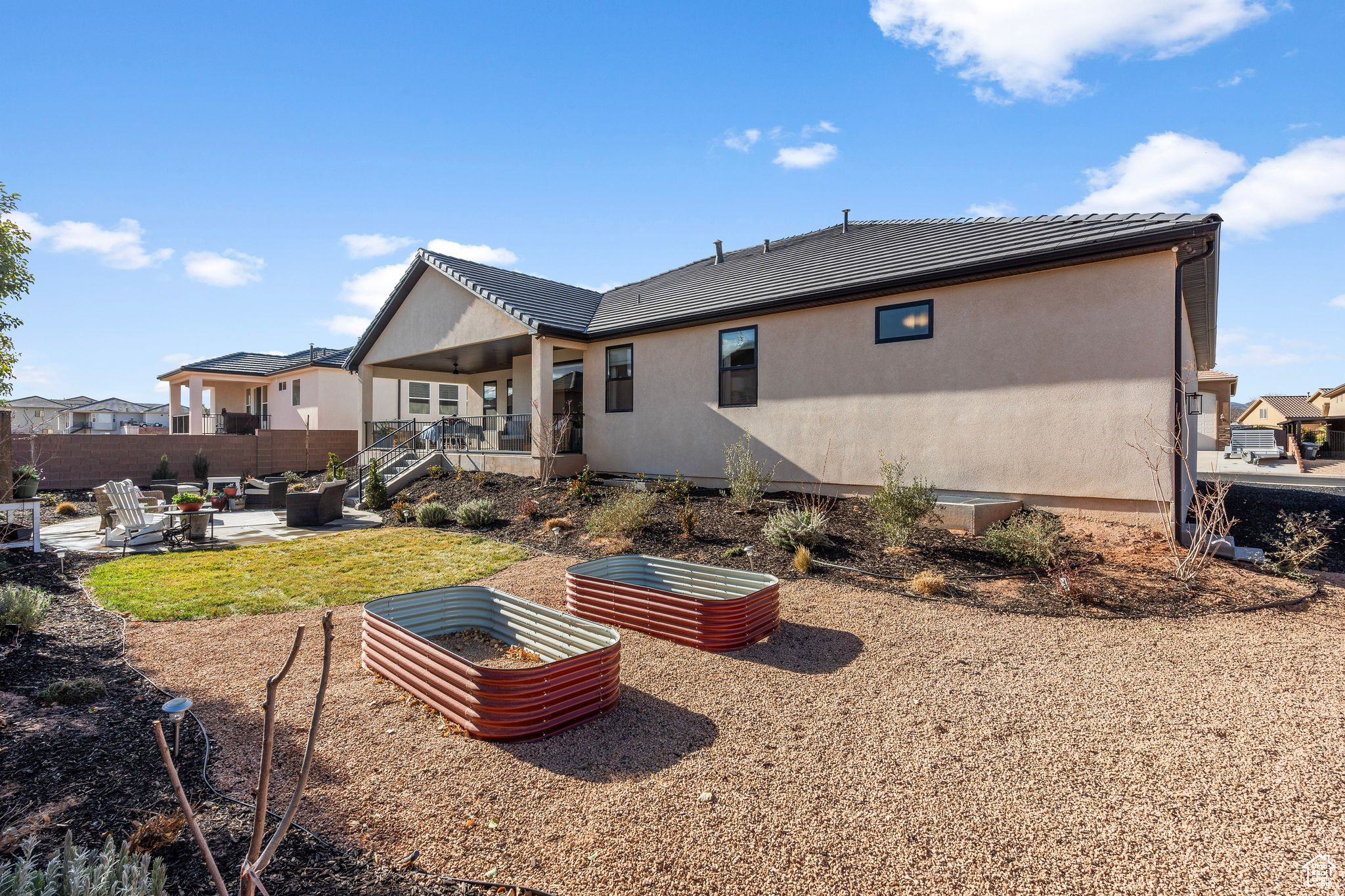 Rear view of property with a patio area