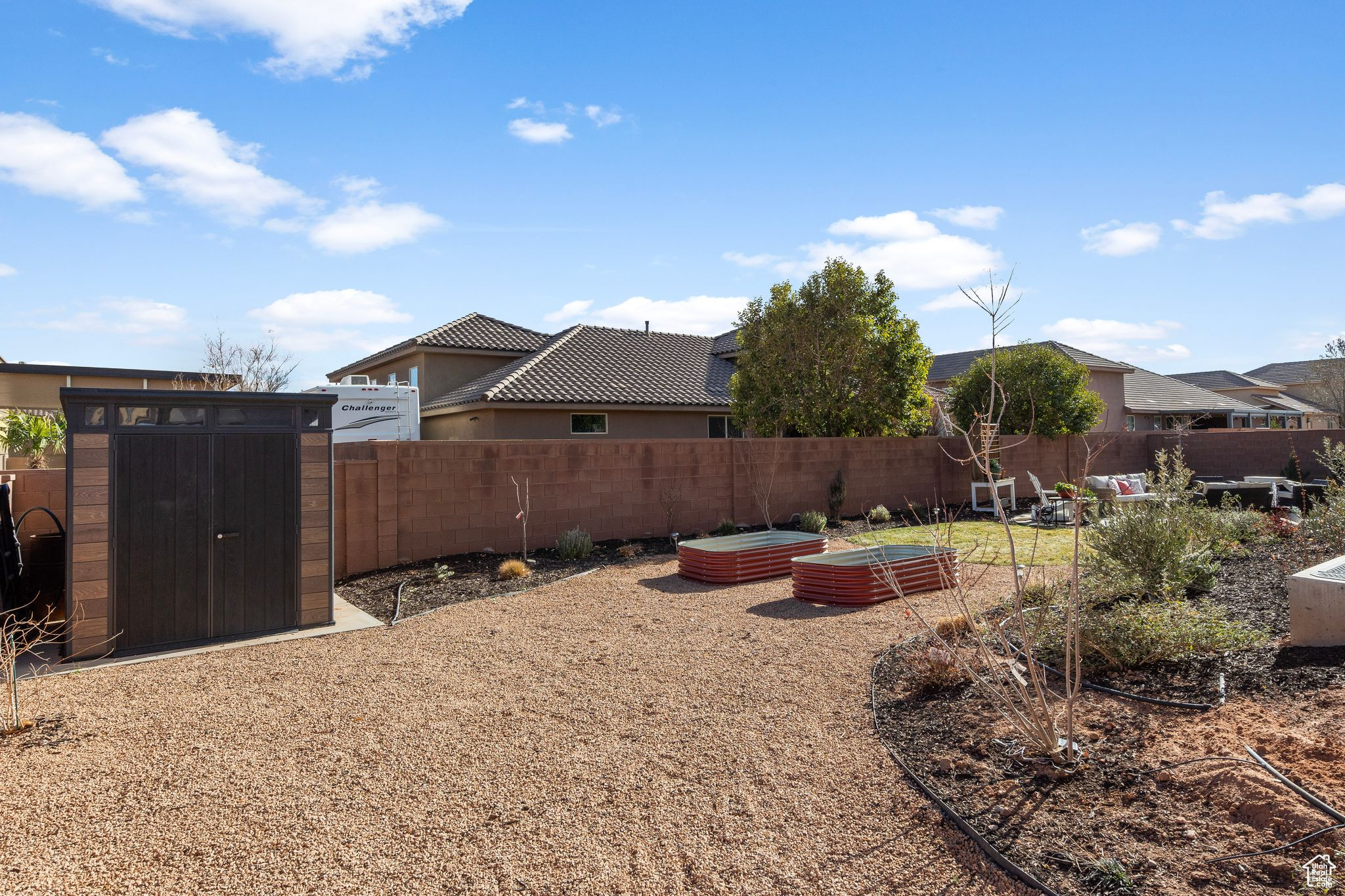 View of yard with a storage shed