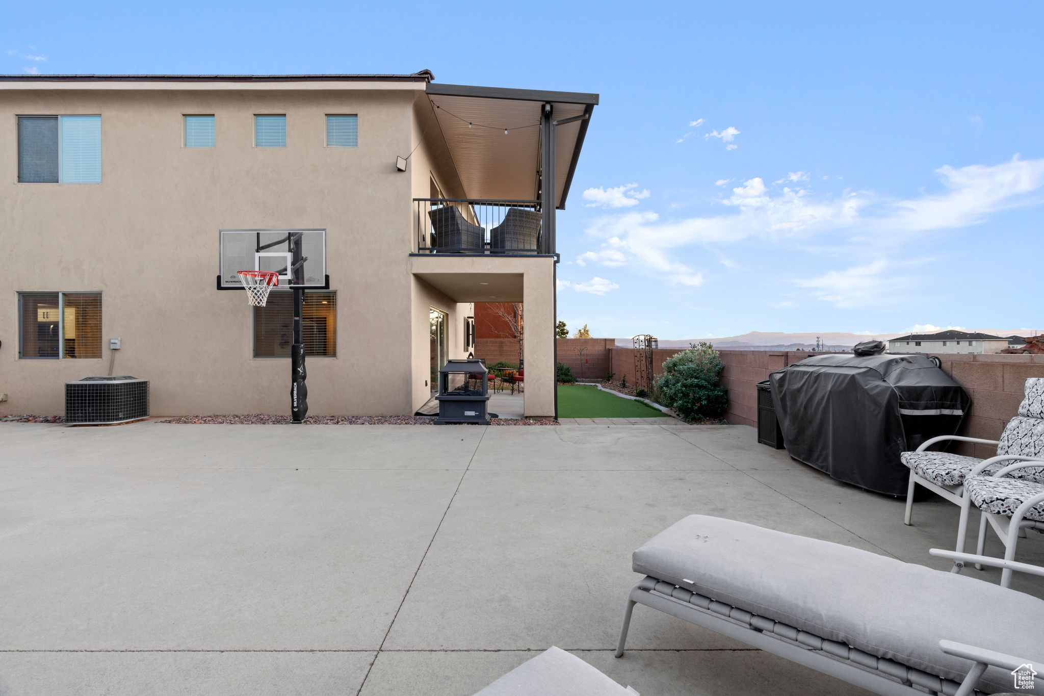 Exterior space featuring cooling unit, area for grilling, and a balcony