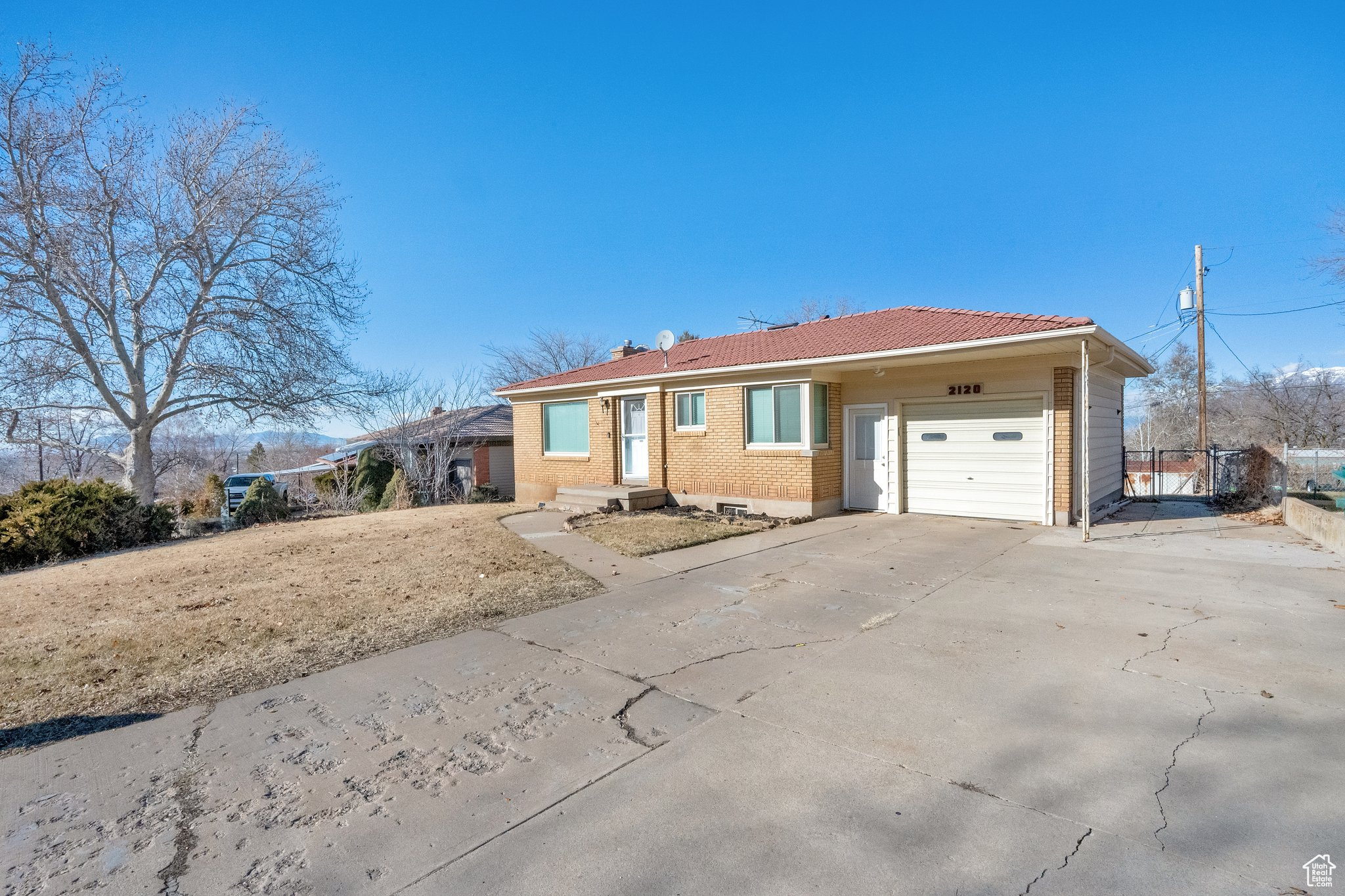 Ranch-style home featuring a garage