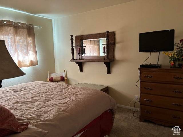 Bedroom featuring carpet flooring