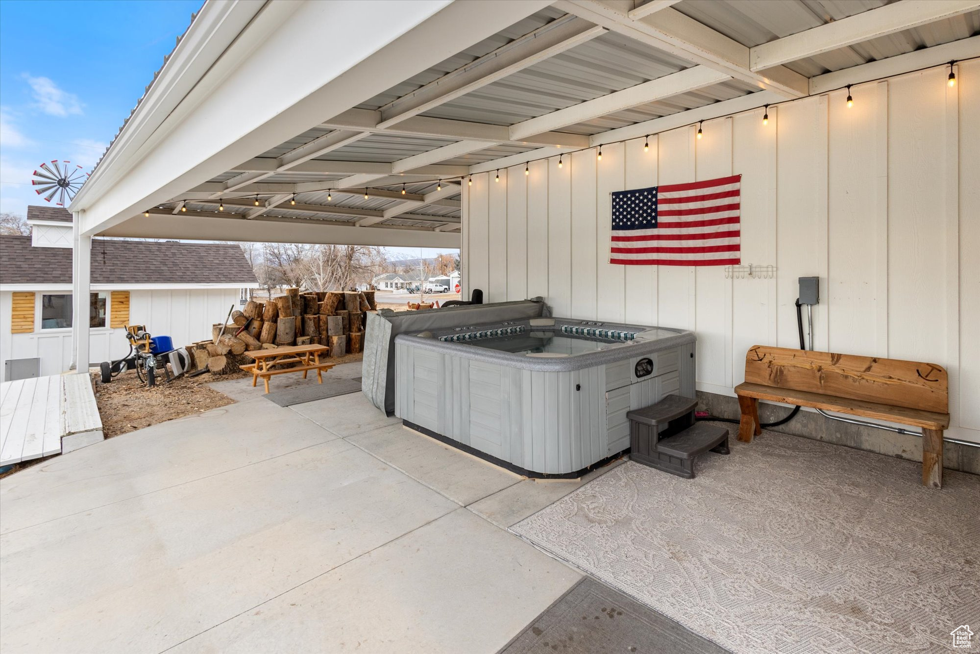 View of patio / terrace featuring a hot tub