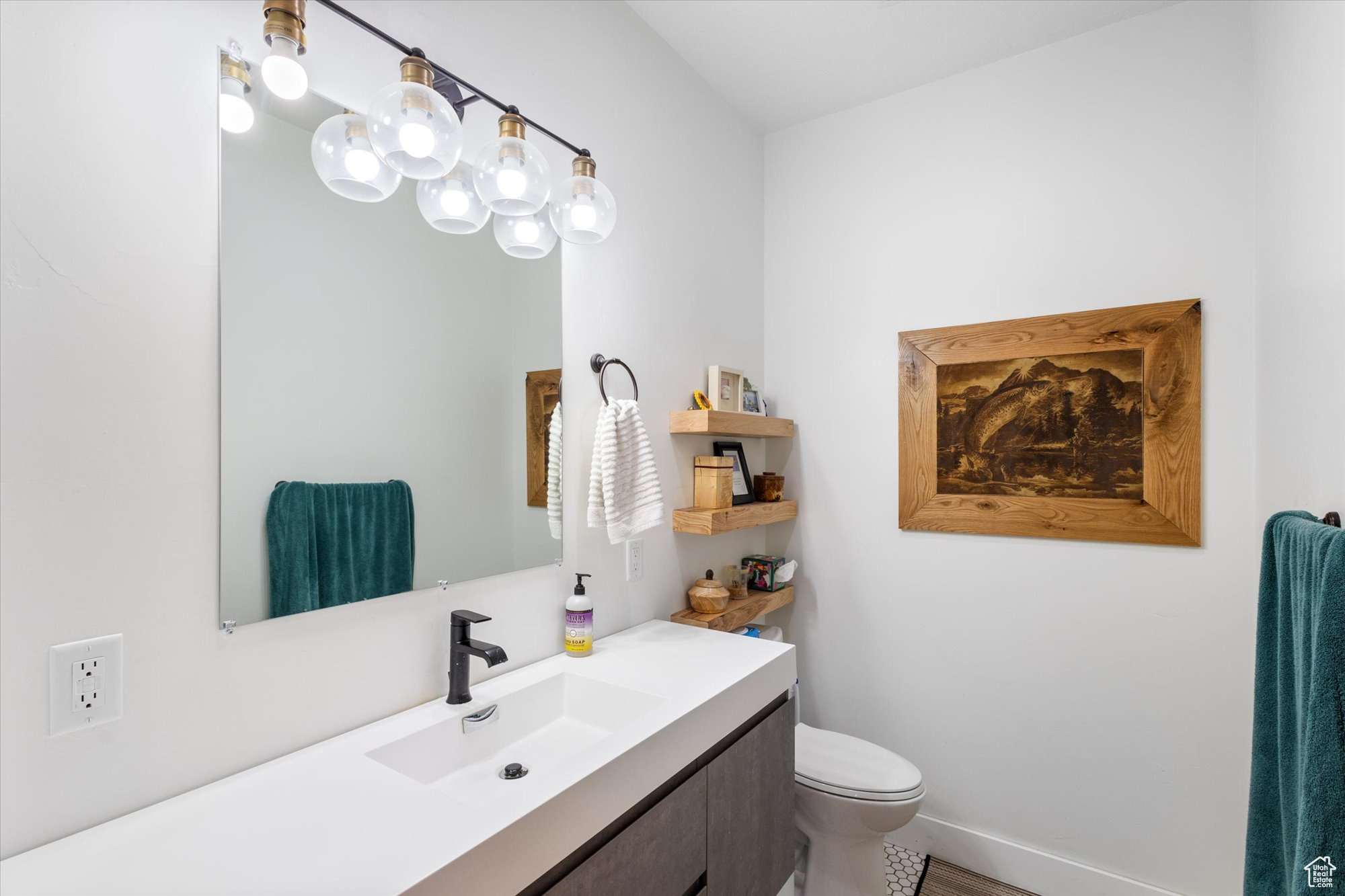 Bathroom with vanity and toilet