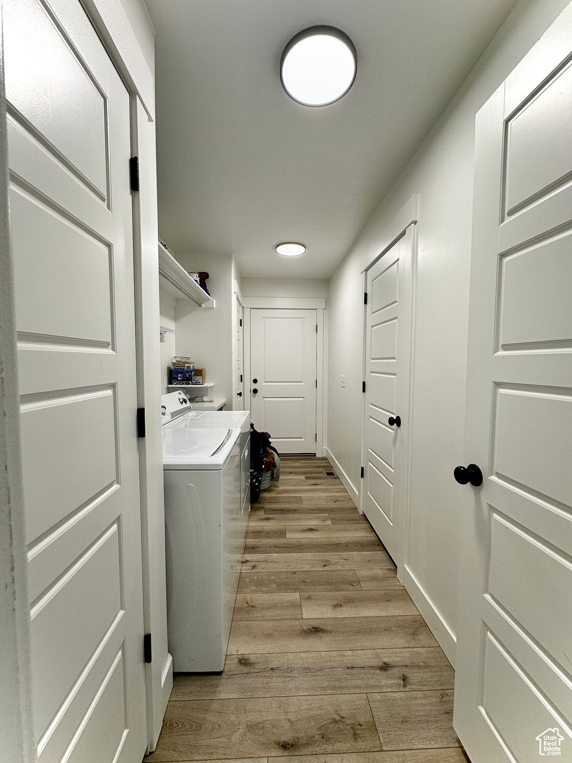 Laundry room entry into the 2 car garage