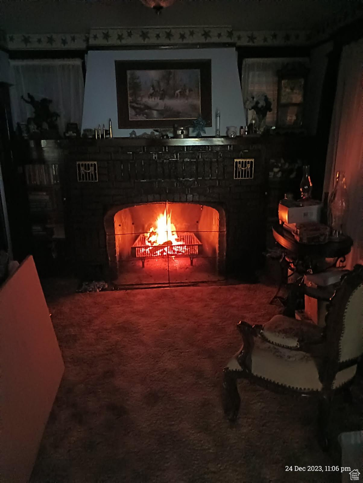 Sitting room featuring carpet flooring