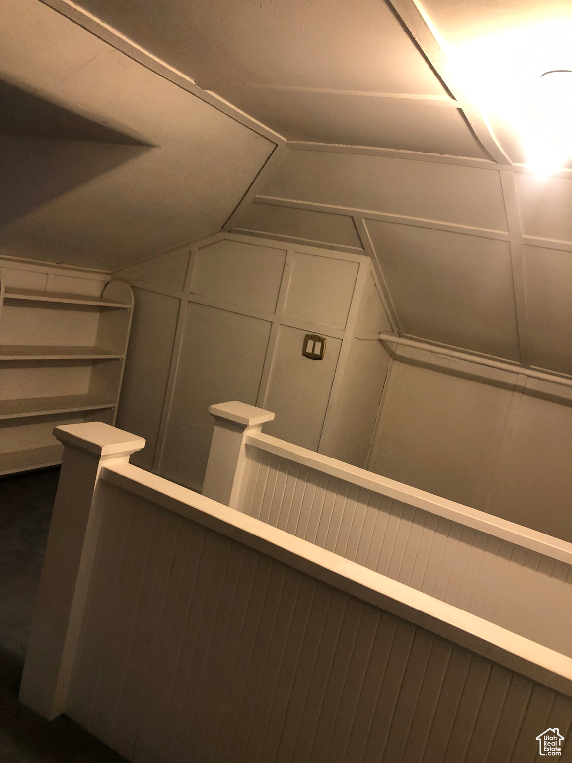 Interior space featuring vaulted ceiling