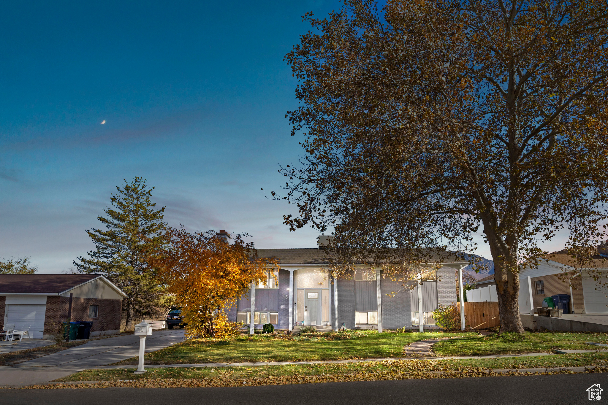 View of front facade with a lawn