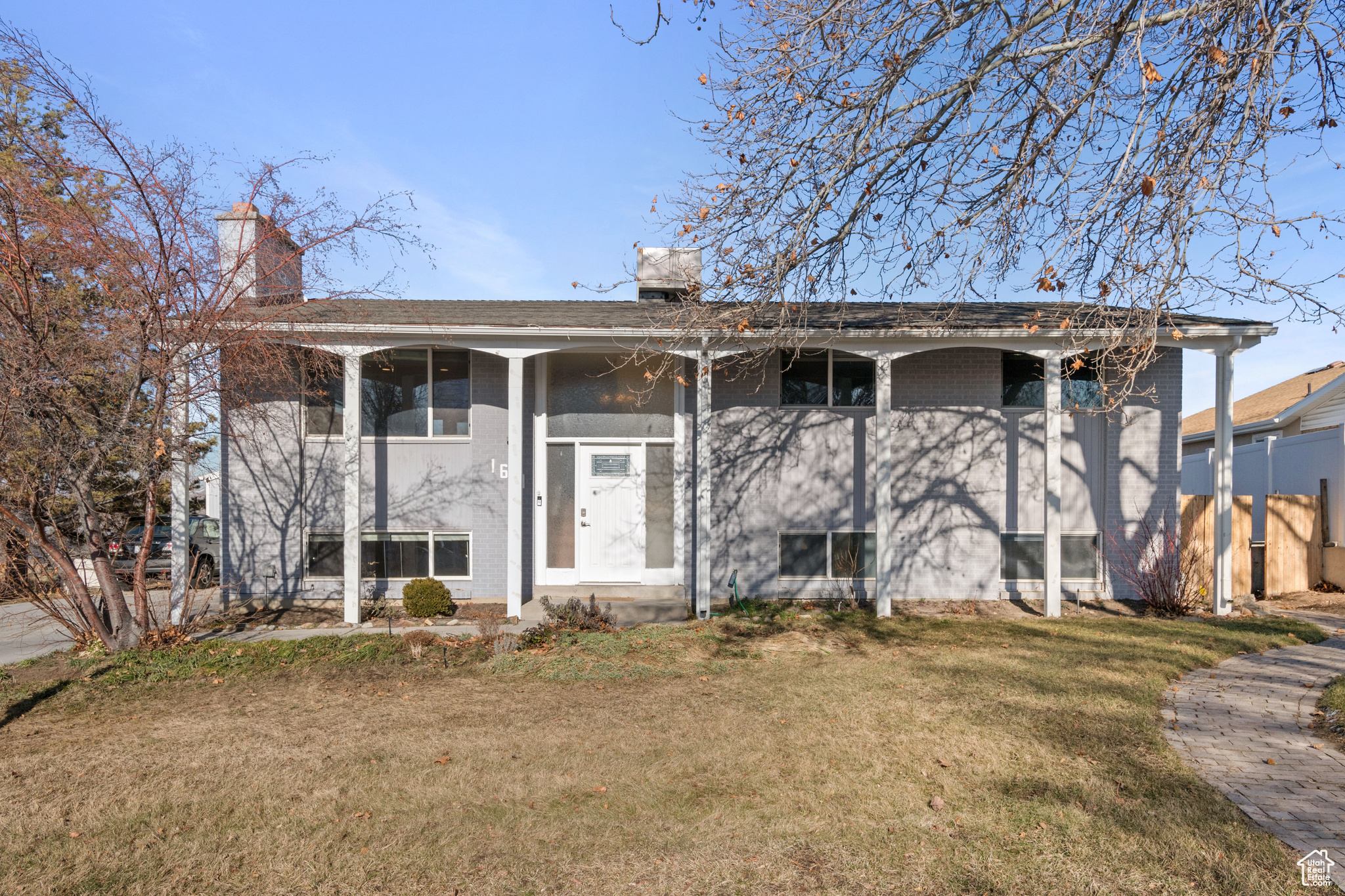 Split foyer home with a front lawn
