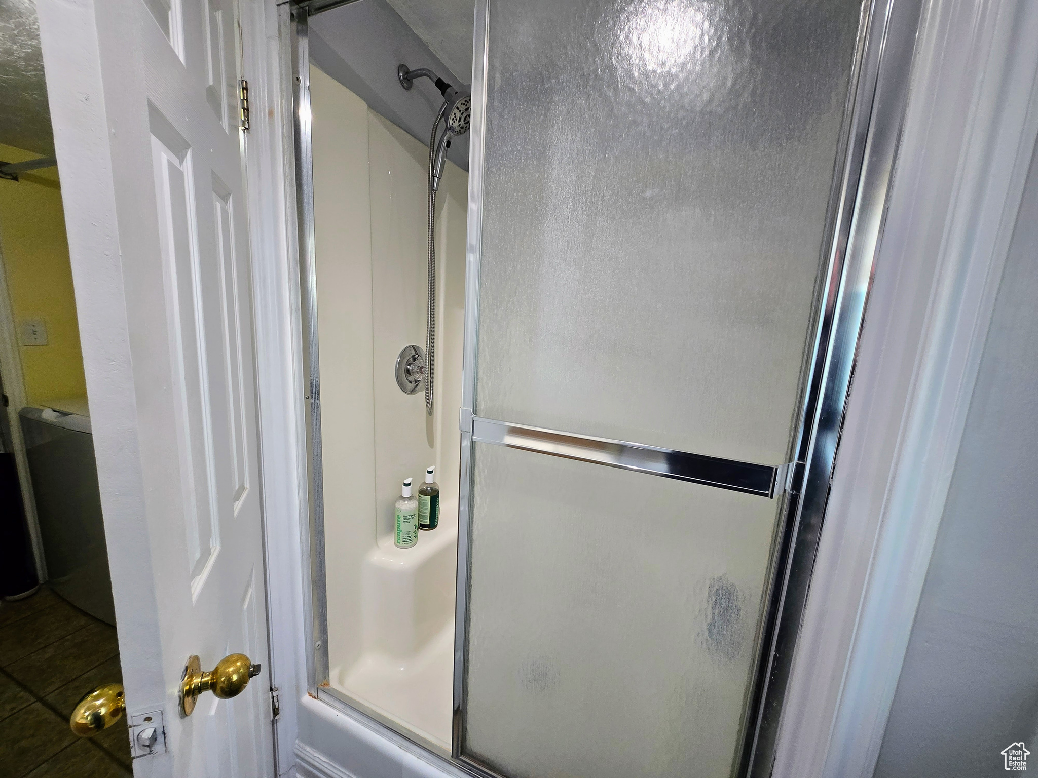 Bathroom featuring an enclosed shower