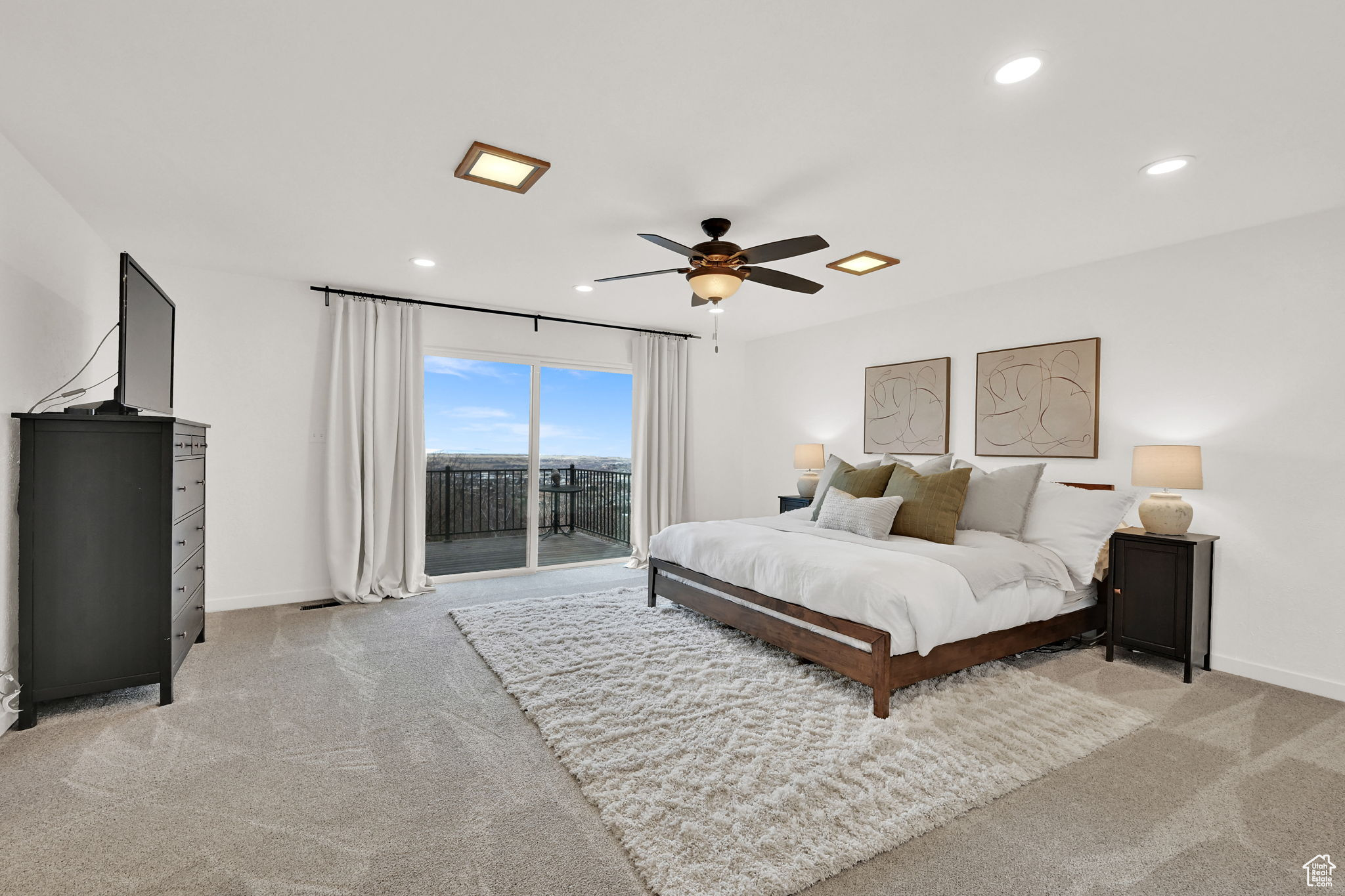 Primary bedroom with balcony