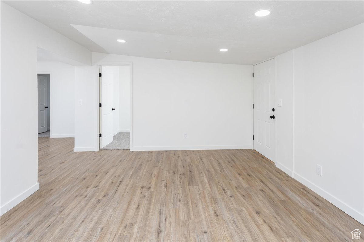 Spare room featuring light hardwood / wood-style floors