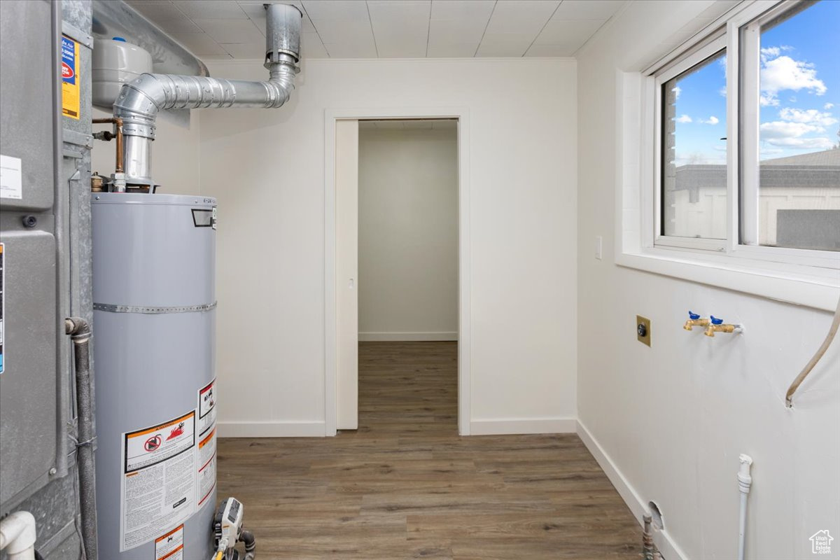 Utility room with gas water heater