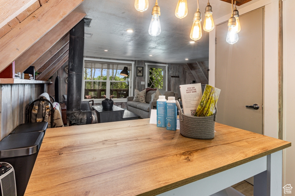 Dining area with lofted ceiling