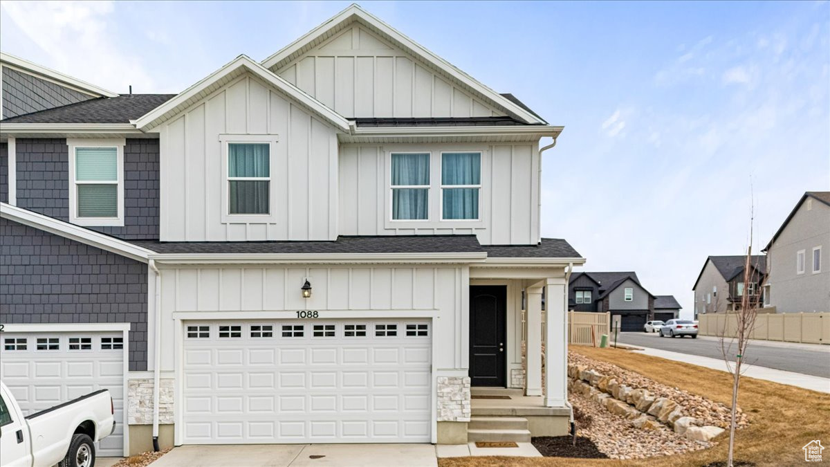 View of front of house with a garage