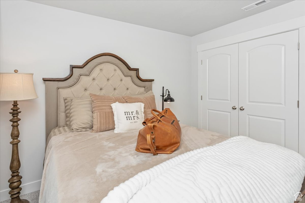 Bedroom featuring a closet