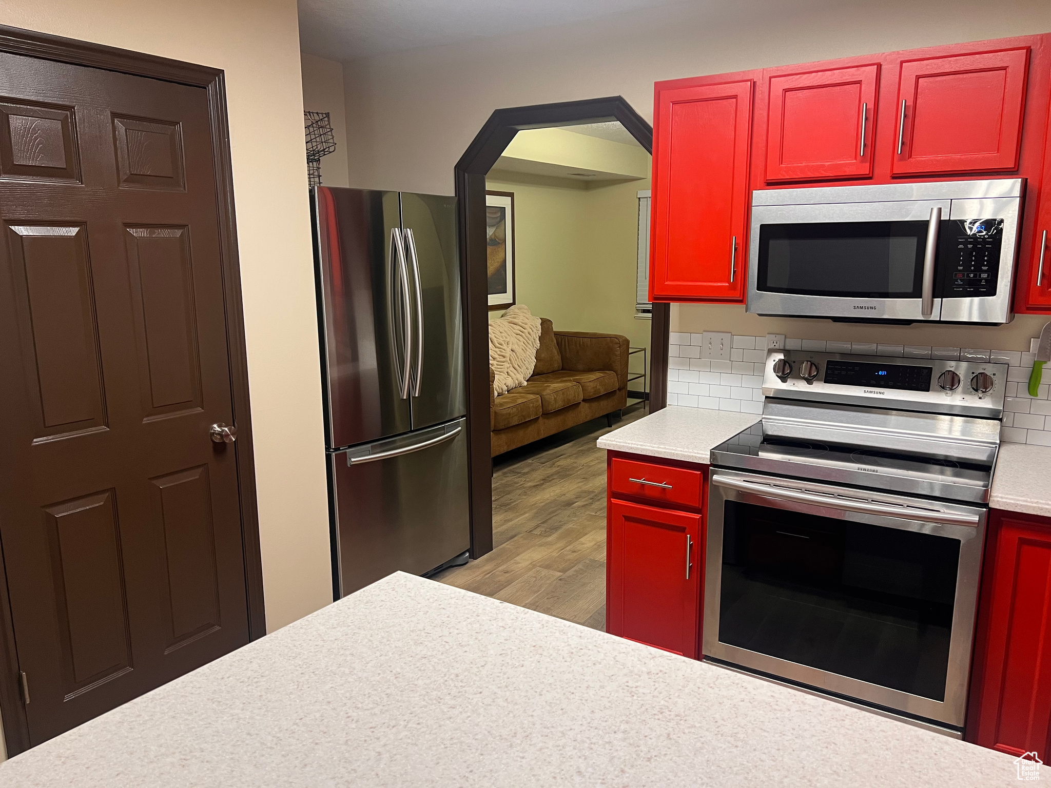 Kitchen featuring stainless steel appliances and light wood-type flooring