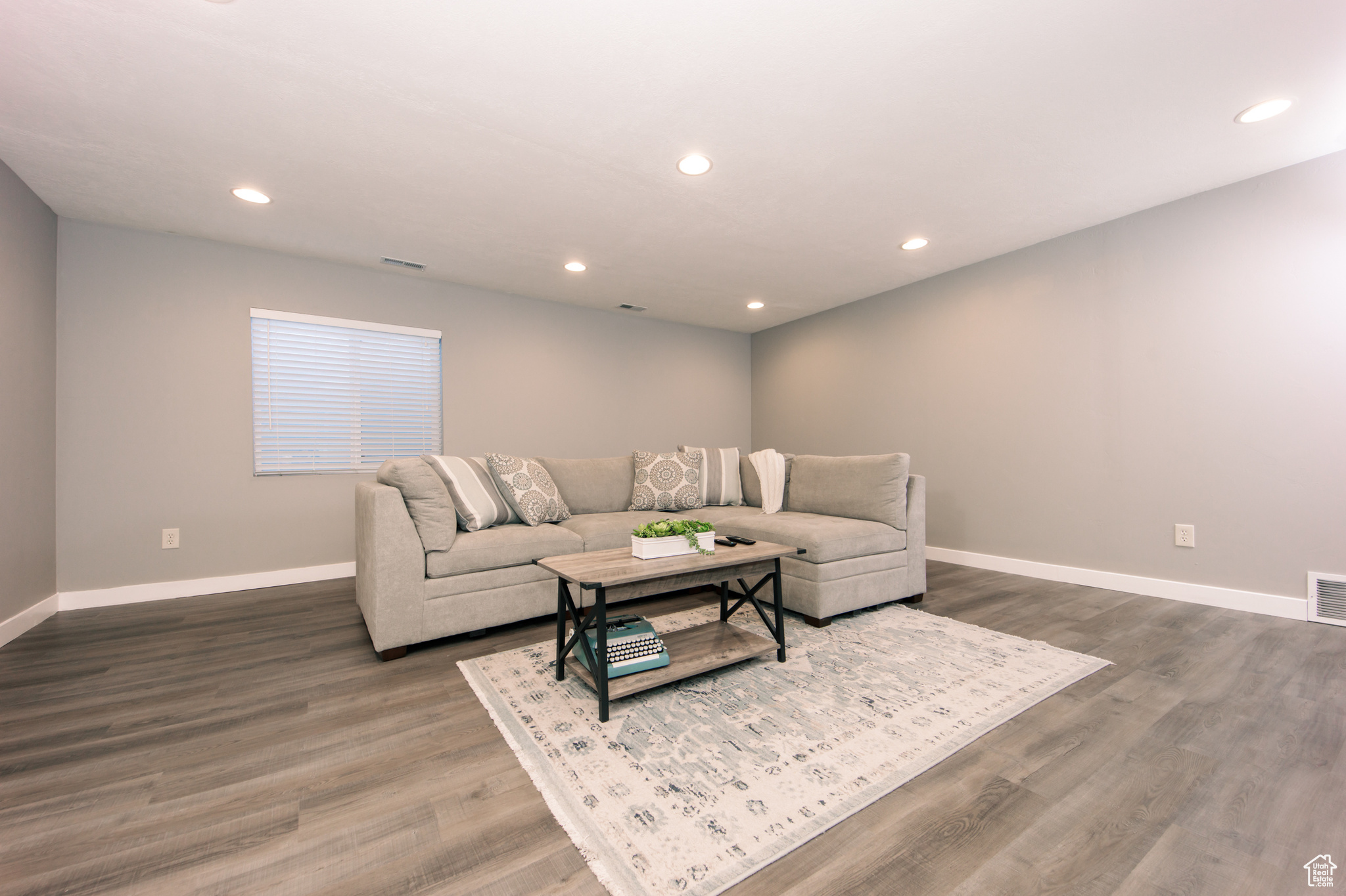 Living room featuring wood-type flooring